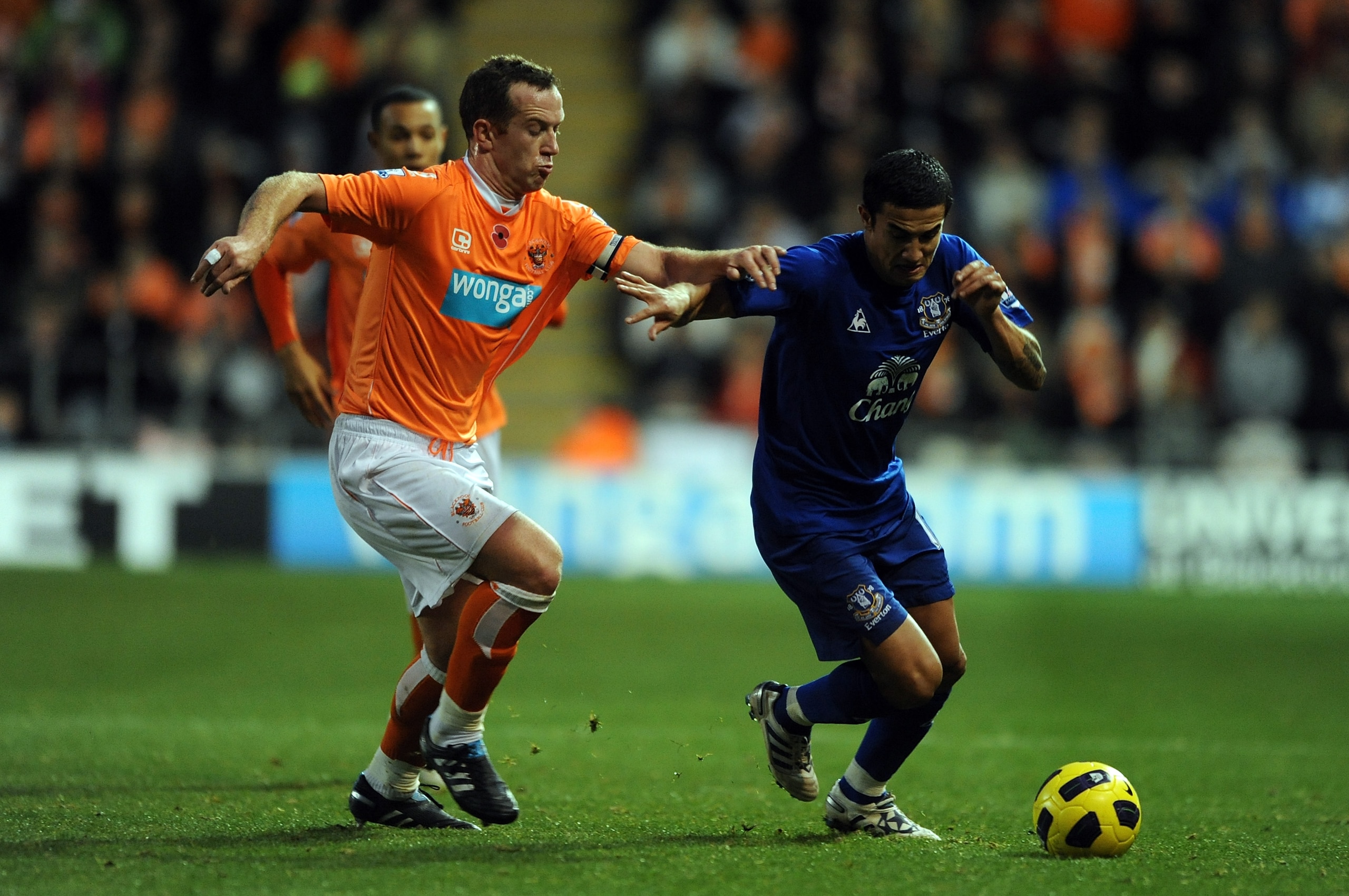 BLACKPOOL, ENGLAND - NOVEMBER 06: Tim Cahill of Everton battles with Charlie Adam of Blackpool during the Barclays Premier League match between Blackpool and Everton at Bloomfield Road on November 6, 2010 in Blackpool, England. (Photo by Chris Brunskill BLACKPOOL, ENGLAND - NOVEMBER 06: Tim Cahill of Everton battles with Charlie Adam of Blackpool during the Barclays Premier League match between Blackpool and Everton at Bloomfield Road on November 6, 2010 in Blackpool, England. (Photo by Chris Brunskill