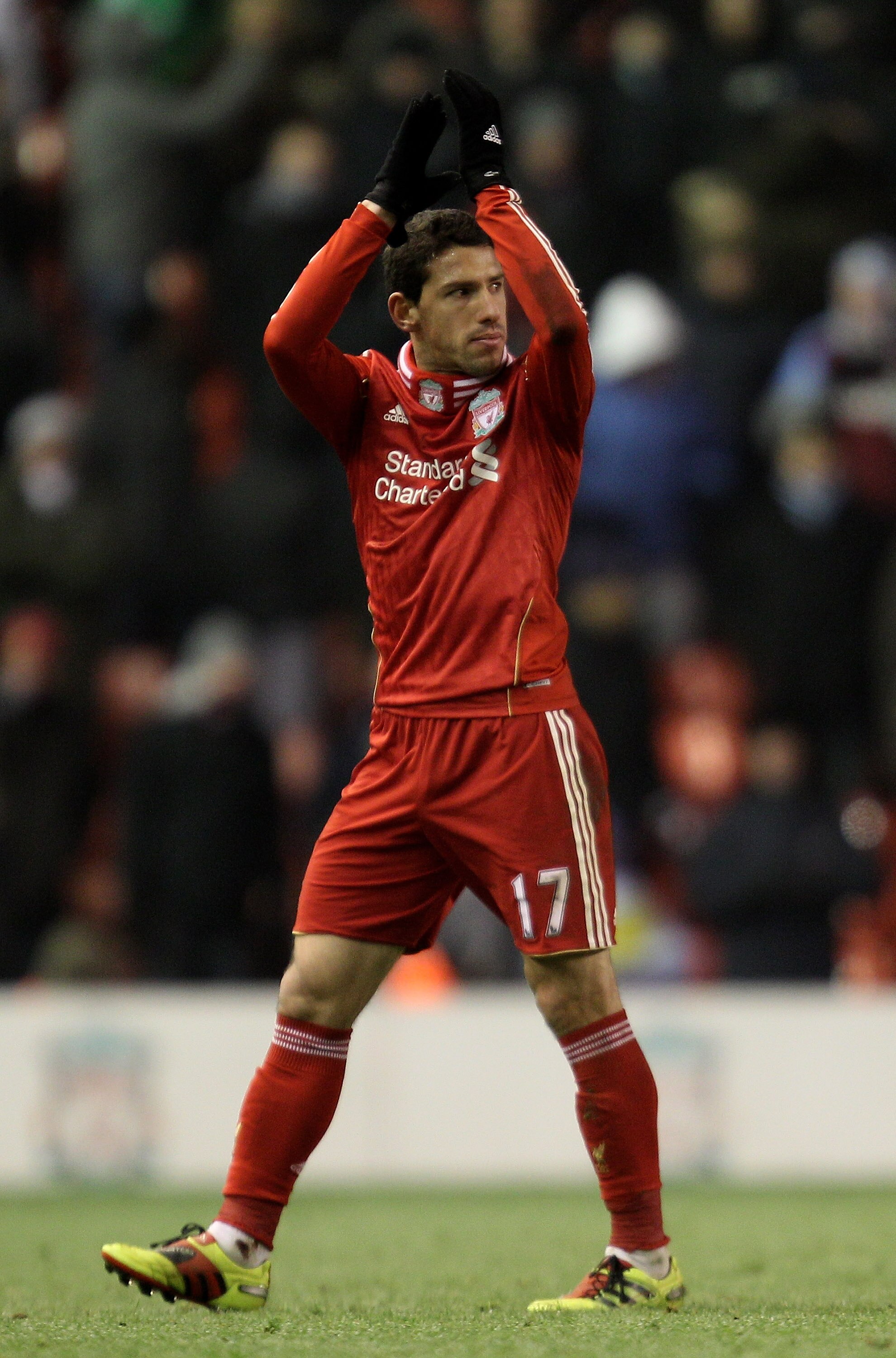 LIVERPOOL, ENGLAND - DECEMBER 06:   Maxi Rodriguez of Liverpool acknowledges the crowd during the Barclays Premier League match between Liverpool and Aston Villa at Anfield on December 6, 2010 in Liverpool, England. (Photo by Mark Thompson/Getty Images)