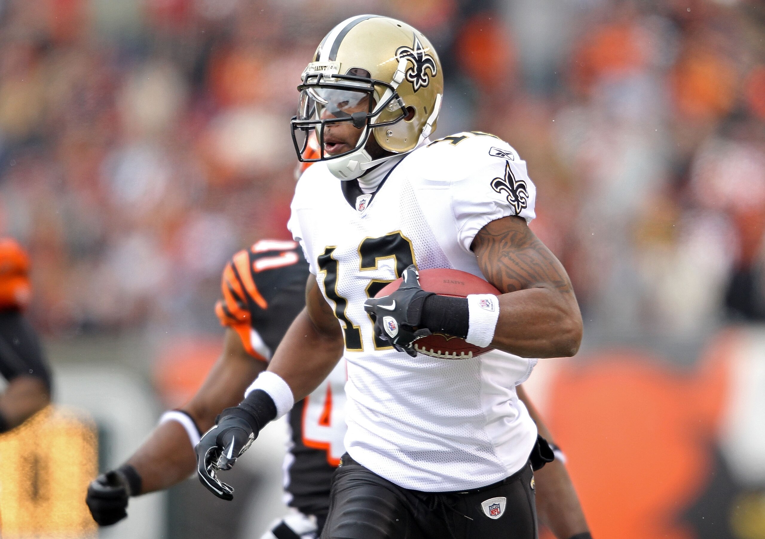 CINCINNATI, OH - DECEMBER 05: Marques Colston #12 of the New Orleans Saints runs with the ball during the NFL game against the Cincinnati Bengals at Paul Brown Stadium on December 5, 2010 in Cincinnati, Ohio. The Saints won 34-30. (Photo by Andy Lyons/ CINCINNATI, OH - DECEMBER 05: Marques Colston #12 of the New Orleans Saints runs with the ball during the NFL game against the Cincinnati Bengals at Paul Brown Stadium on December 5, 2010 in Cincinnati, Ohio. The Saints won 34-30. (Photo by Andy Lyons/