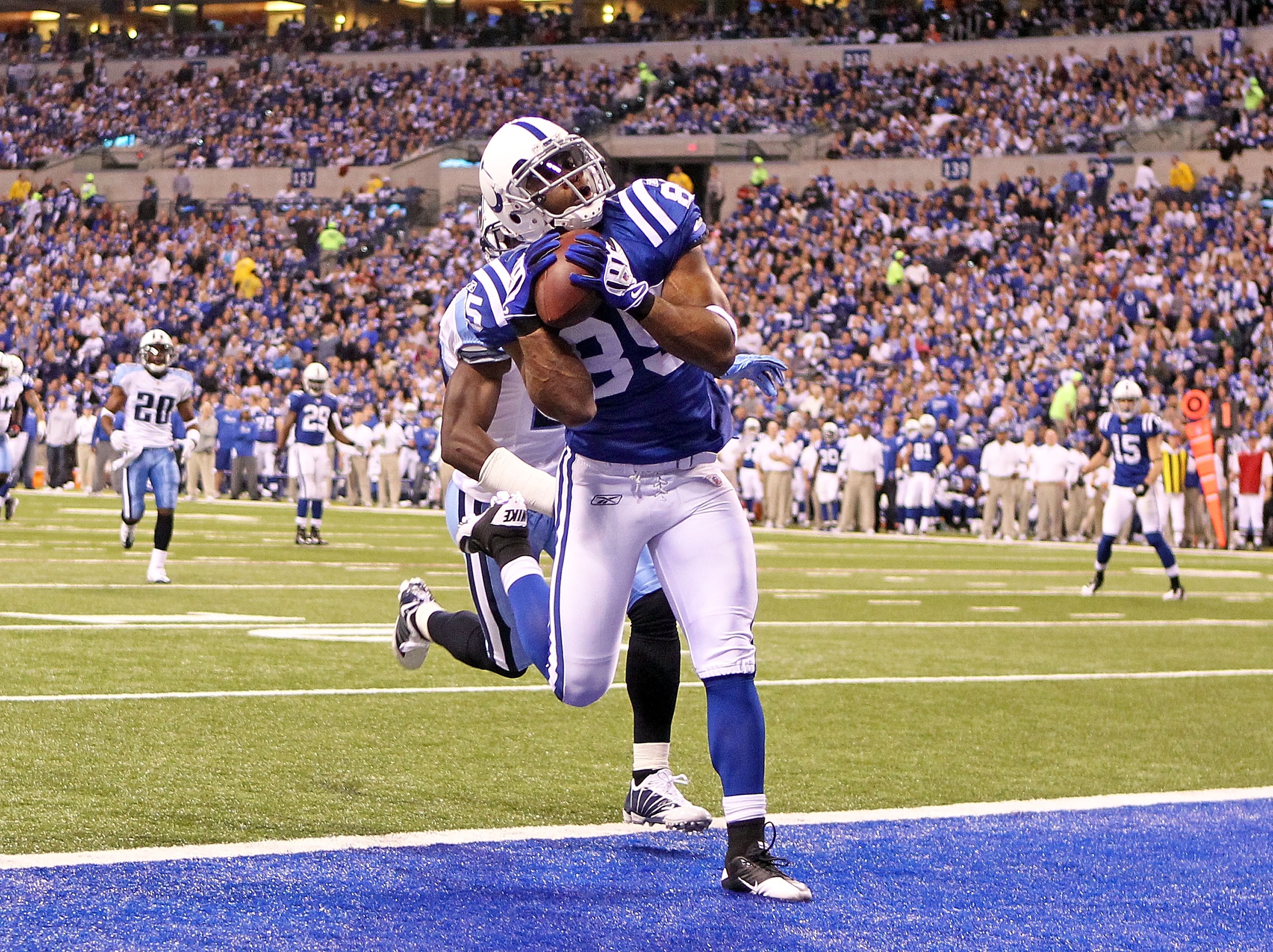 INDIANAPOLIS - JANUARY 02: Pierre Garcon #85 of the Indianapolis Colts catches a touchdown pass during NFL game against the Tennessee Titans at Lucas Oil Stadium on January 2, 2011 in Indianapolis, Indiana. The Colts won 23-20.(Photo by Andy Lyons/Getty INDIANAPOLIS - JANUARY 02: Pierre Garcon #85 of the Indianapolis Colts catches a touchdown pass during NFL game against the Tennessee Titans at Lucas Oil Stadium on January 2, 2011 in Indianapolis, Indiana. The Colts won 23-20.(Photo by Andy Lyons/Getty