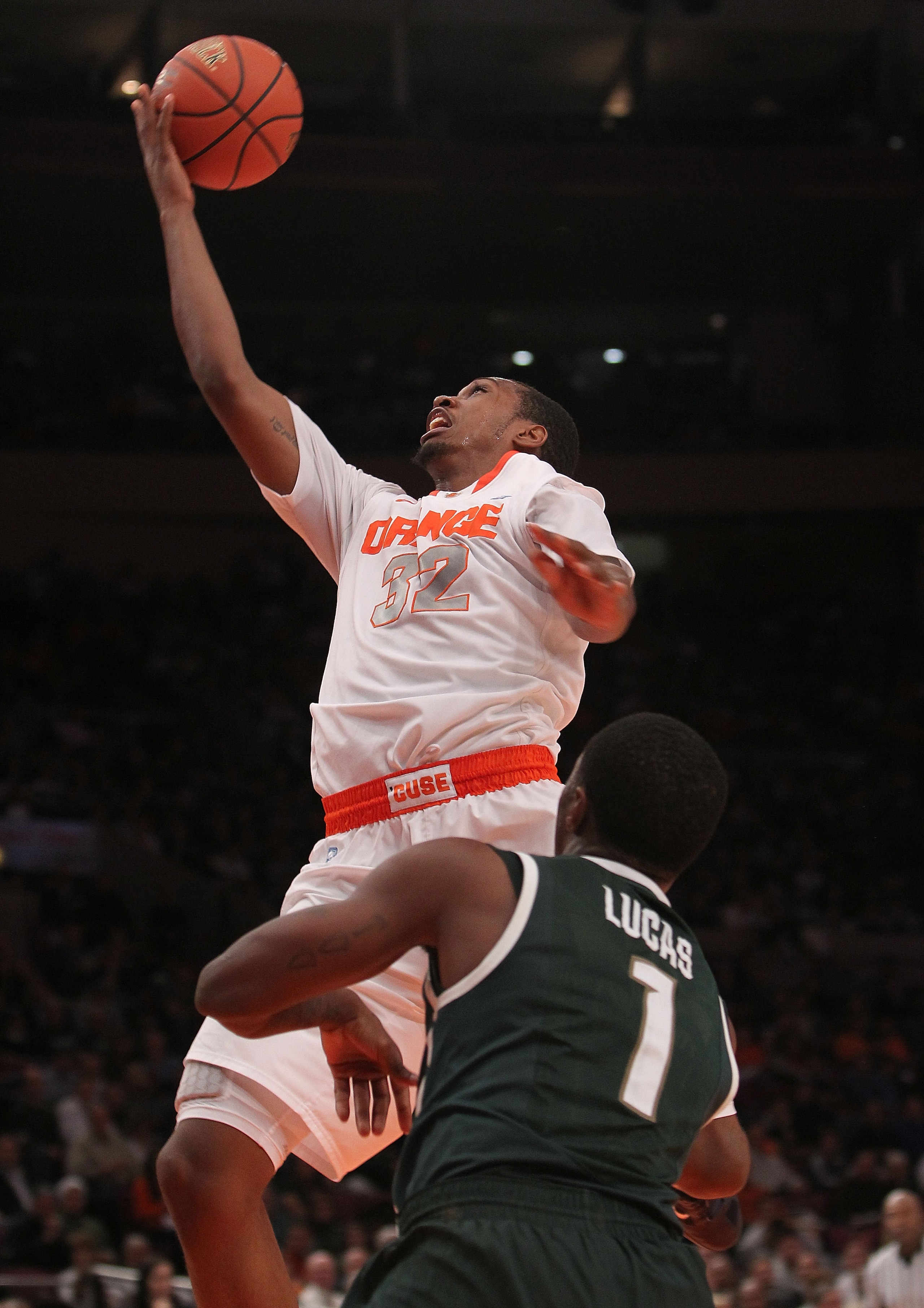 NEW YORK, NY - DECEMBER 07: Kris Joseph #32 of Syracuse Orange lays the ball up against the Michigan State Spartans during their game at the Jimmy V Classic at Madison Square Garden on December 7, 2010 in New York City. (Photo by Nick Laham/Getty Images) NEW YORK, NY - DECEMBER 07: Kris Joseph #32 of Syracuse Orange lays the ball up against the Michigan State Spartans during their game at the Jimmy V Classic at Madison Square Garden on December 7, 2010 in New York City. (Photo by Nick Laham/Getty Images)