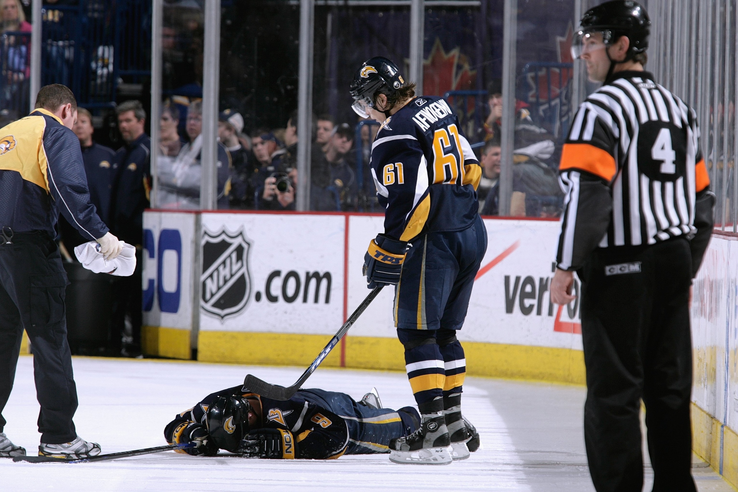 BUFFALO, NY - MARCH 25:  Maxim Afinogenov #61 of the Buffalo Sabres stands over Derek Roy #9, who was injured during the game against the Ottawa Senators on March 25, 2008 at HSBC Arena in Buffalo, New York. (Photo by Rick Stewart/Getty Images)
