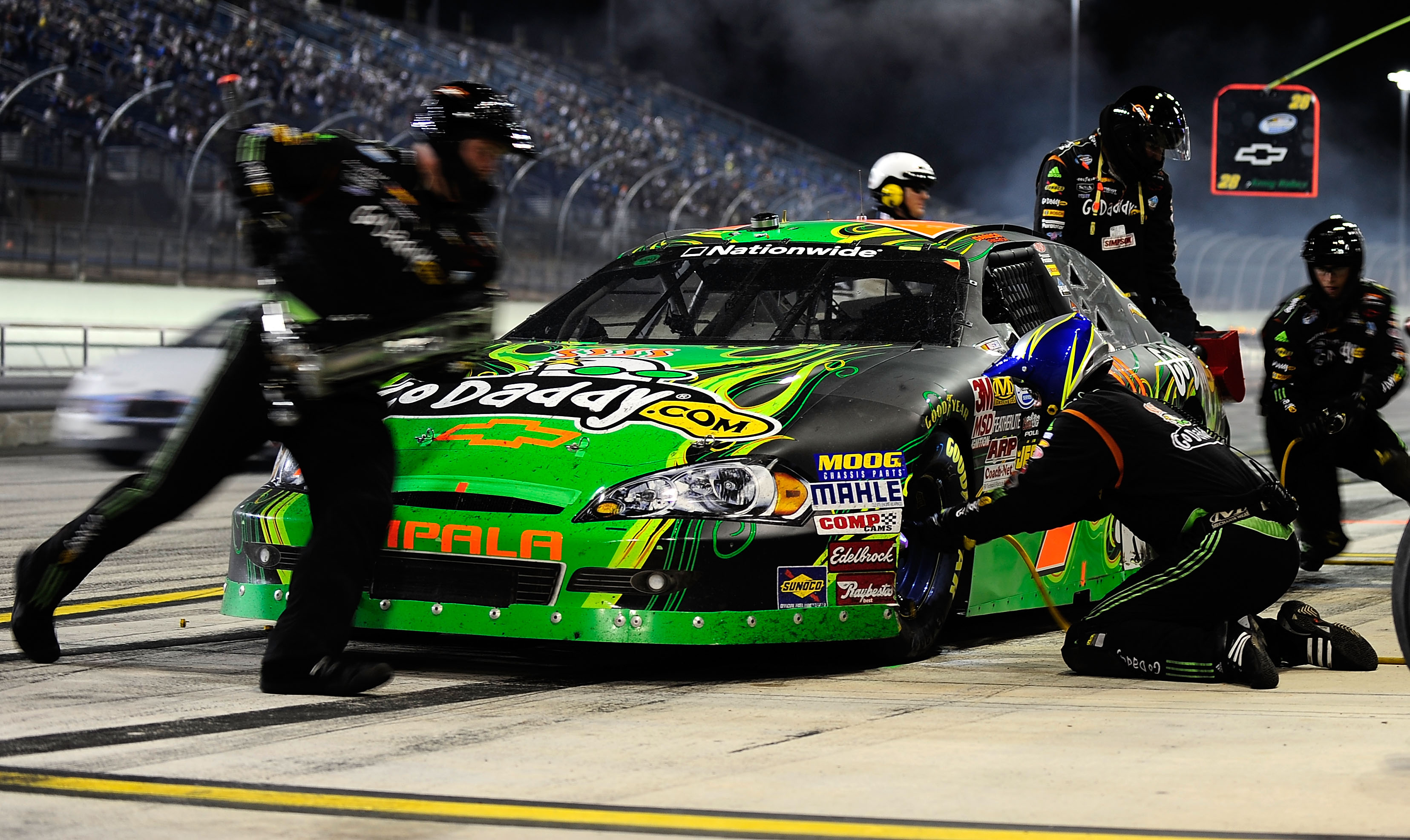 HOMESTEAD, FL - NOVEMBER 20:  Danica Patrick, driver of the #7 GoDaddy.com Chevrolet, makes a pit stop during the NASCAR Nationwide Series Ford 300 at Homestead-Miami Speedway on November 20, 2010 in Homestead, Florida.  (Photo by Rusty Jarrett/Getty Imag