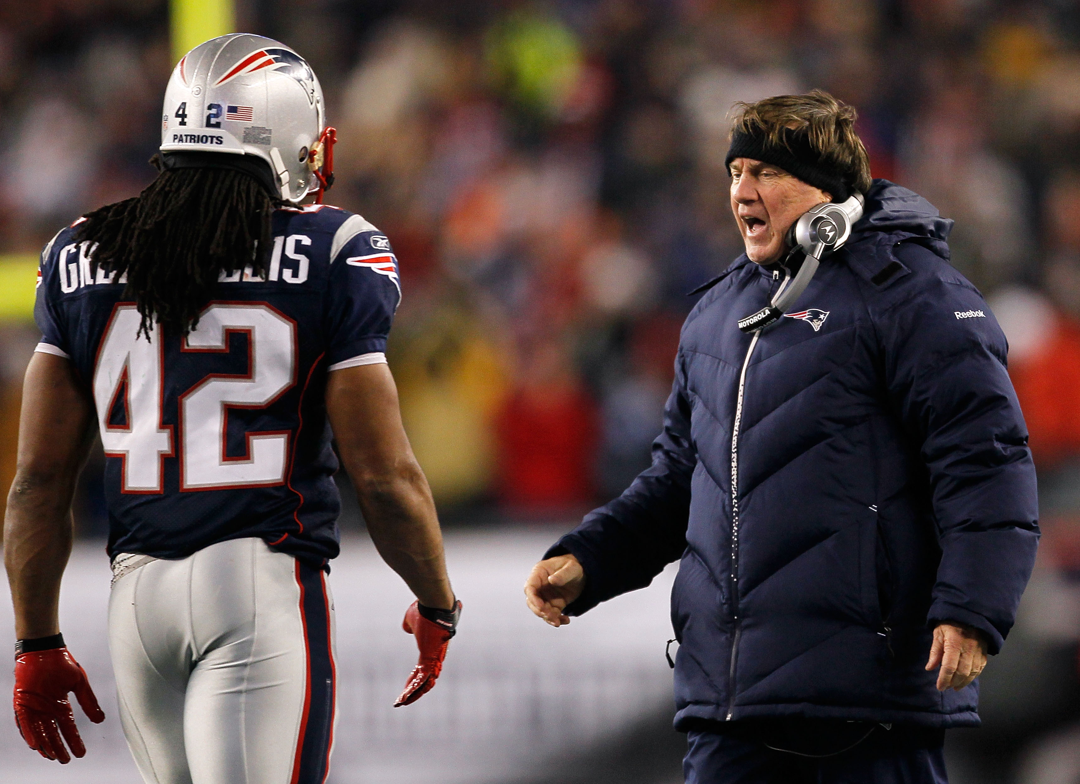 FOXBORO, MA - DECEMBER 06:  Head coach Bill Belichick of the New England Patriots congratulates BenJarvus Green-Ellis #42 after Green-Ellis scored a 5-yard rushing touchdown in the fourth quarter against the New York Jets at Gillette Stadium on December 6