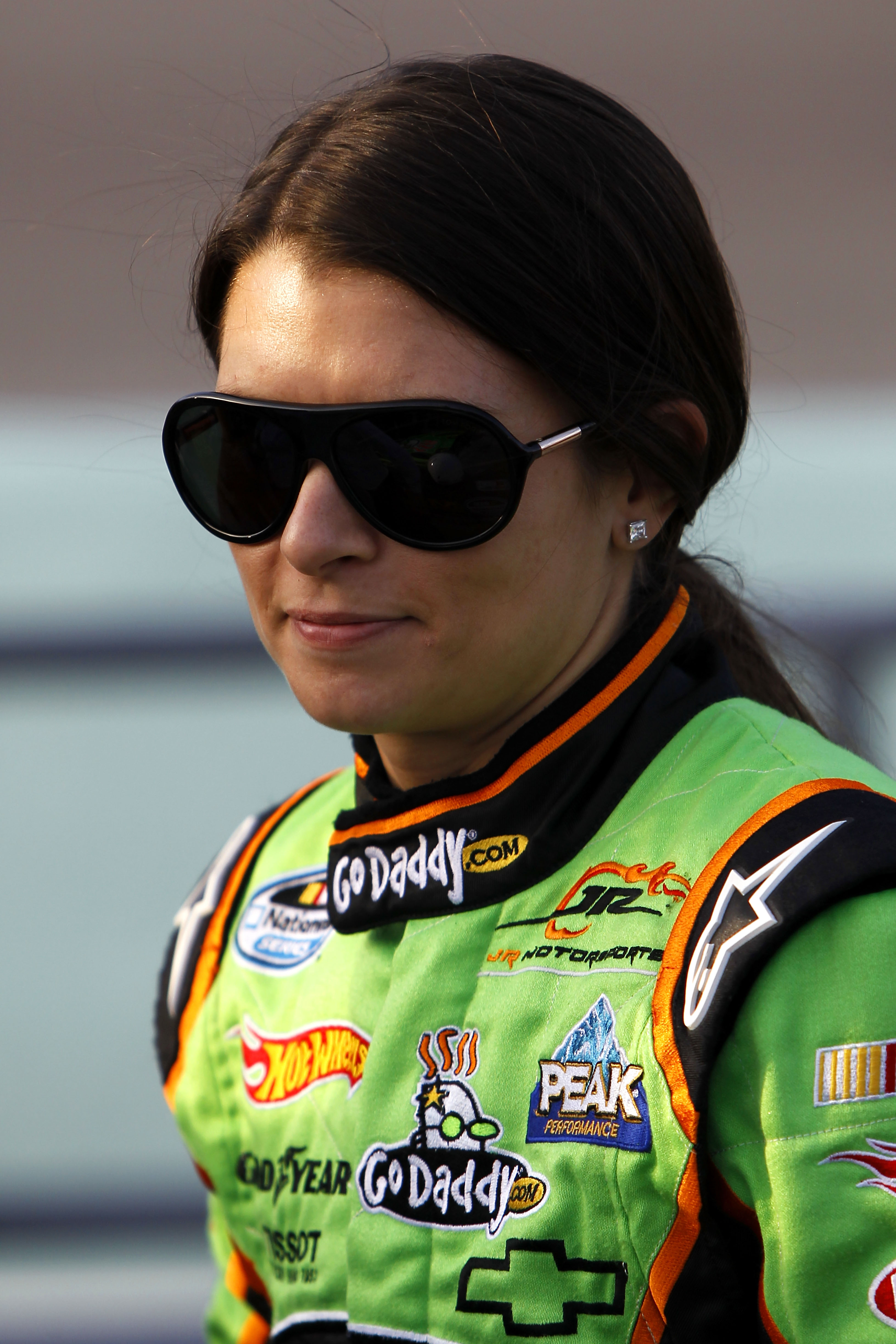 HOMESTEAD, FL - NOVEMBER 20:  Danica Patrick, driver of the #7 GoDaddy.com Chevrolet, stands on the grid prior to the NASCAR Nationwide Series Ford 300 at Homestead-Miami Speedway on November 20, 2010 in Homestead, Florida.  (Photo by Chris Trotman/Getty