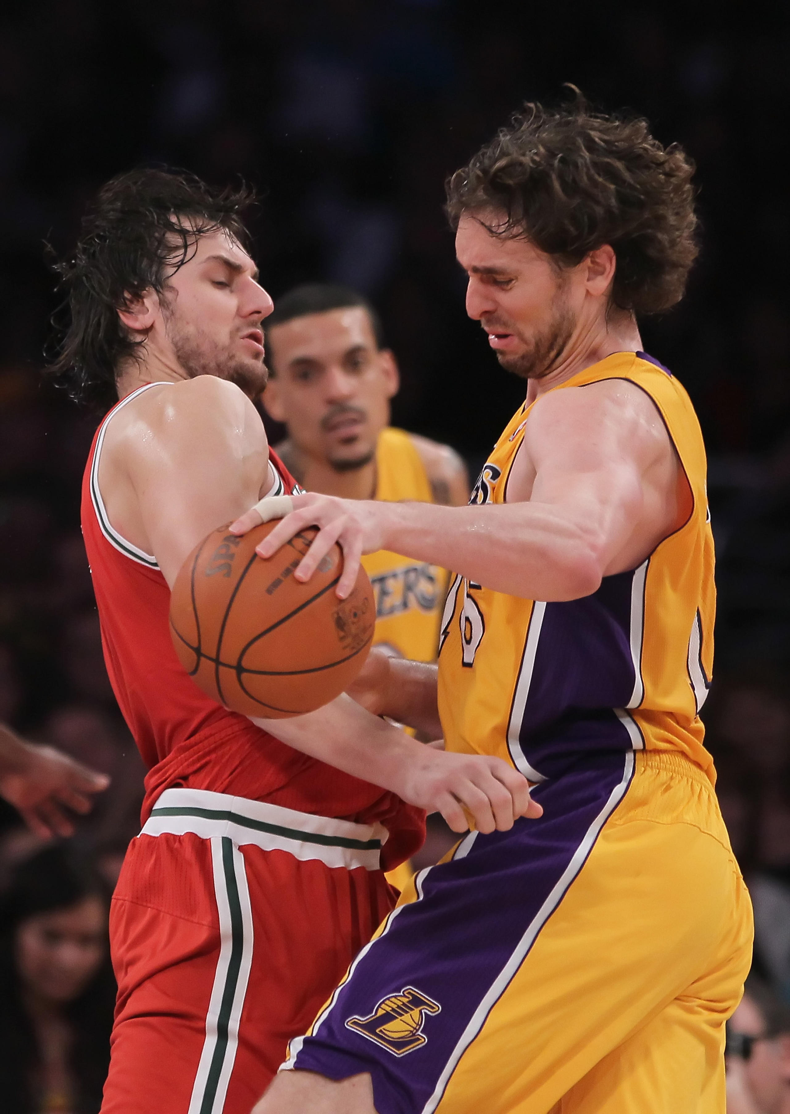 LOS ANGELES, CA - DECEMBER 21: Pau Gasol #16 of the Los Angeles Lakers is defended by Andrew Bogut #6 of the Milwaukee Bucks during the second half at Staples Center on December 21, 2010 in Los Angeles, California. The Bucks defeated the Lakers 98-79. NO LOS ANGELES, CA - DECEMBER 21: Pau Gasol #16 of the Los Angeles Lakers is defended by Andrew Bogut #6 of the Milwaukee Bucks during the second half at Staples Center on December 21, 2010 in Los Angeles, California. The Bucks defeated the Lakers 98-79. NO
