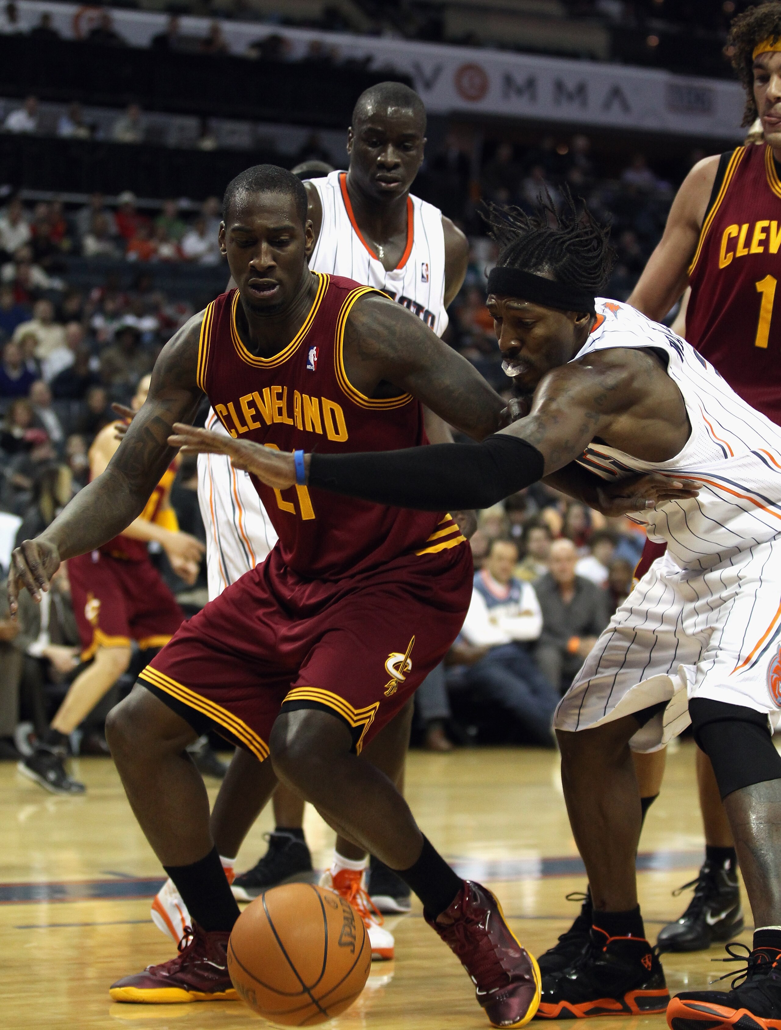 CHARLOTTE, NC - DECEMBER 29: J.J. Hickson #21 of the Cleveland Cavaliers battles for a loose ball with Gerald Wallace #3 of the Charlotte Bobcats during their game at Time Warner Cable Arena on December 29, 2010 in Charlotte, North Carolina. NOTE TO USER CHARLOTTE, NC - DECEMBER 29: J.J. Hickson #21 of the Cleveland Cavaliers battles for a loose ball with Gerald Wallace #3 of the Charlotte Bobcats during their game at Time Warner Cable Arena on December 29, 2010 in Charlotte, North Carolina. NOTE TO USER