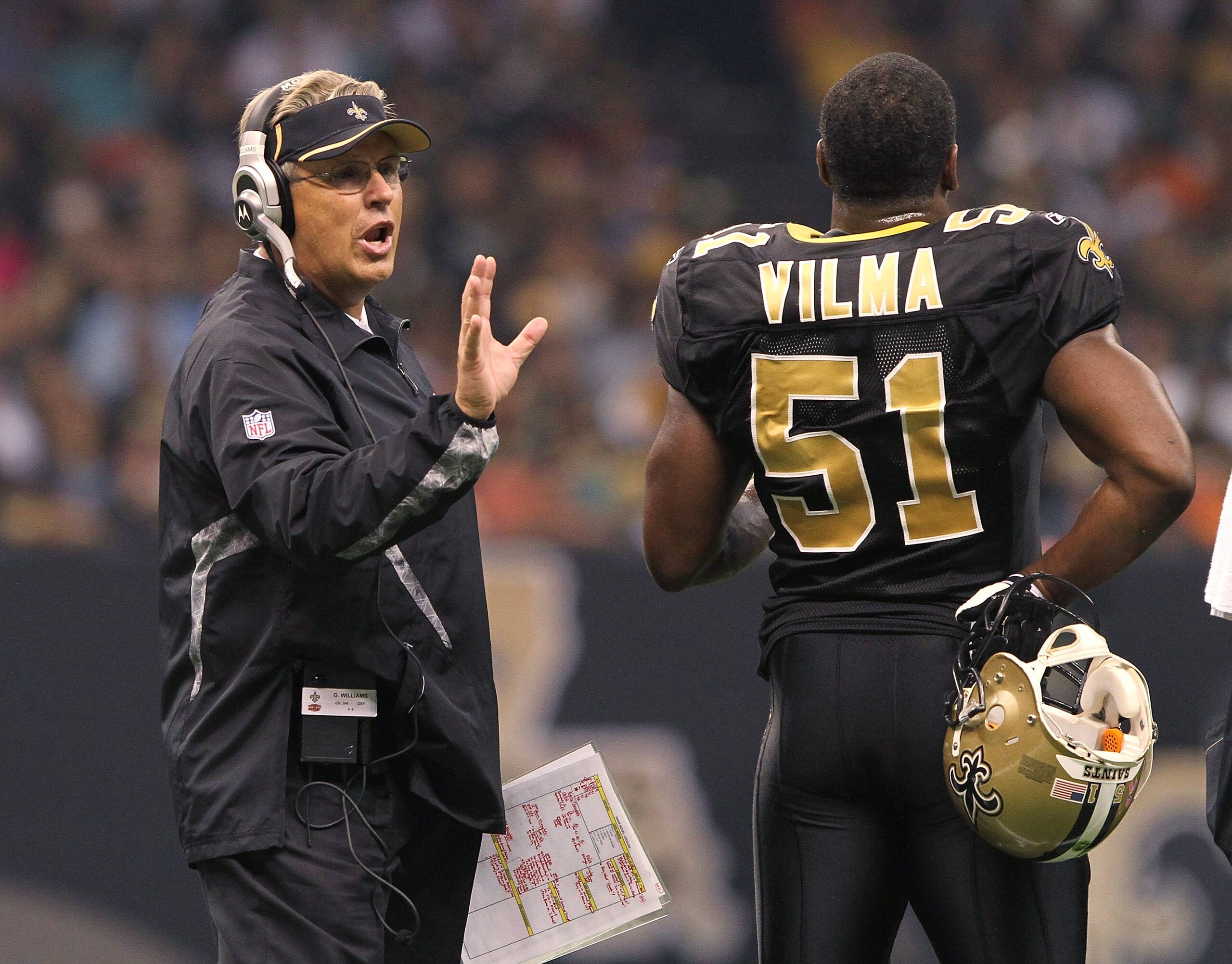 NEW ORLEANS, LA - OCTOBER 31: Defensive coordinator Gregg Williams of the New Orleans Saints talks to Jonathan Vilma #51 during the game against the Pittsburgh Steelers at the Louisiana Superdome on October 31, 2010 in New Orleans, Louisiana. (Photo by Ma