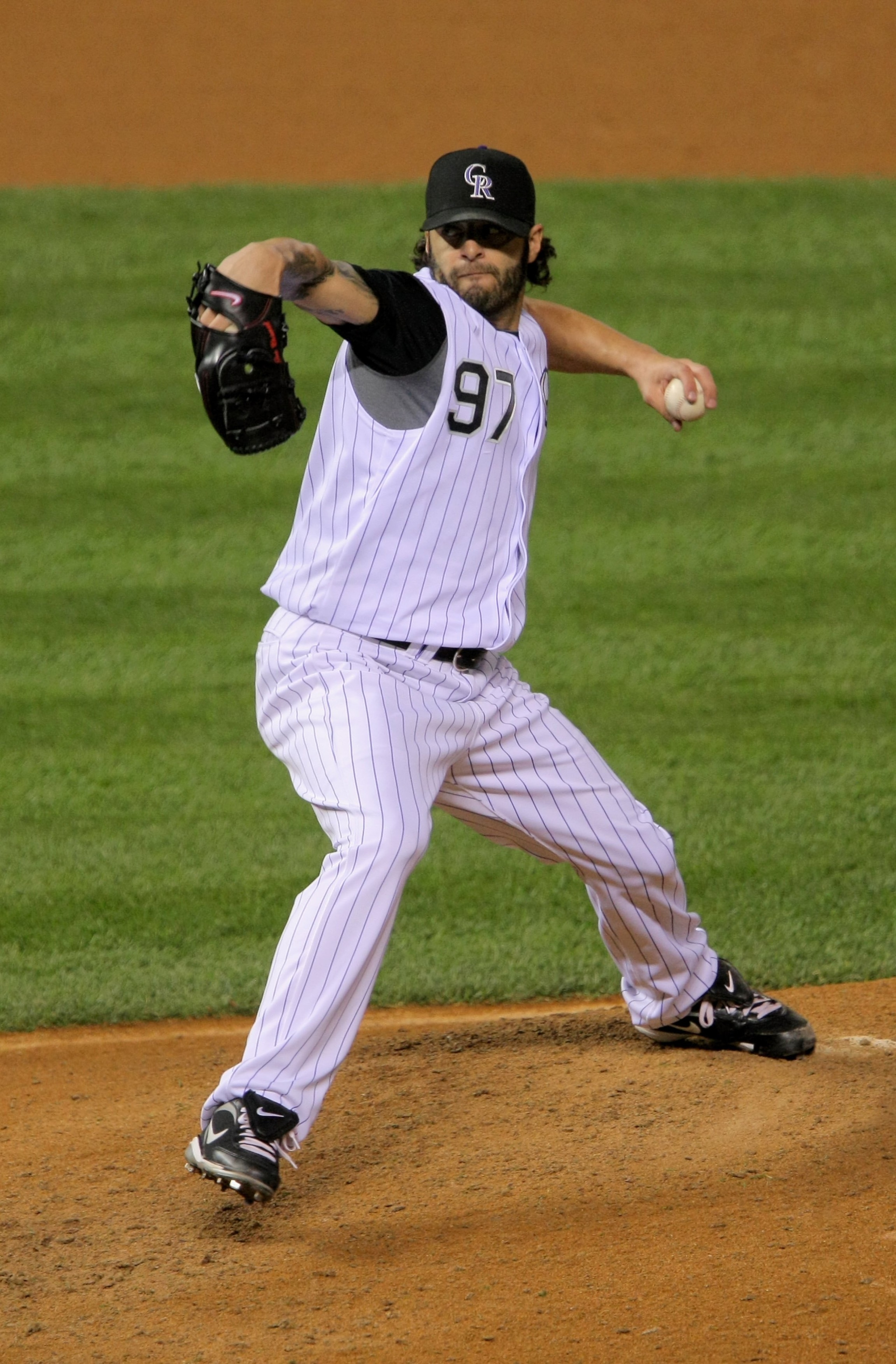 DENVER - AUGUST 24:  Relief pitcher Joe Beimel #97 of the Colorado Rockies delivers against the San Francisco Giants at Coors Field on August 24, 2009 in Denver, Colorado. The Rockies defeated the Giants 6-4 in 14 innings.  (Photo by Doug Pensinger/Getty