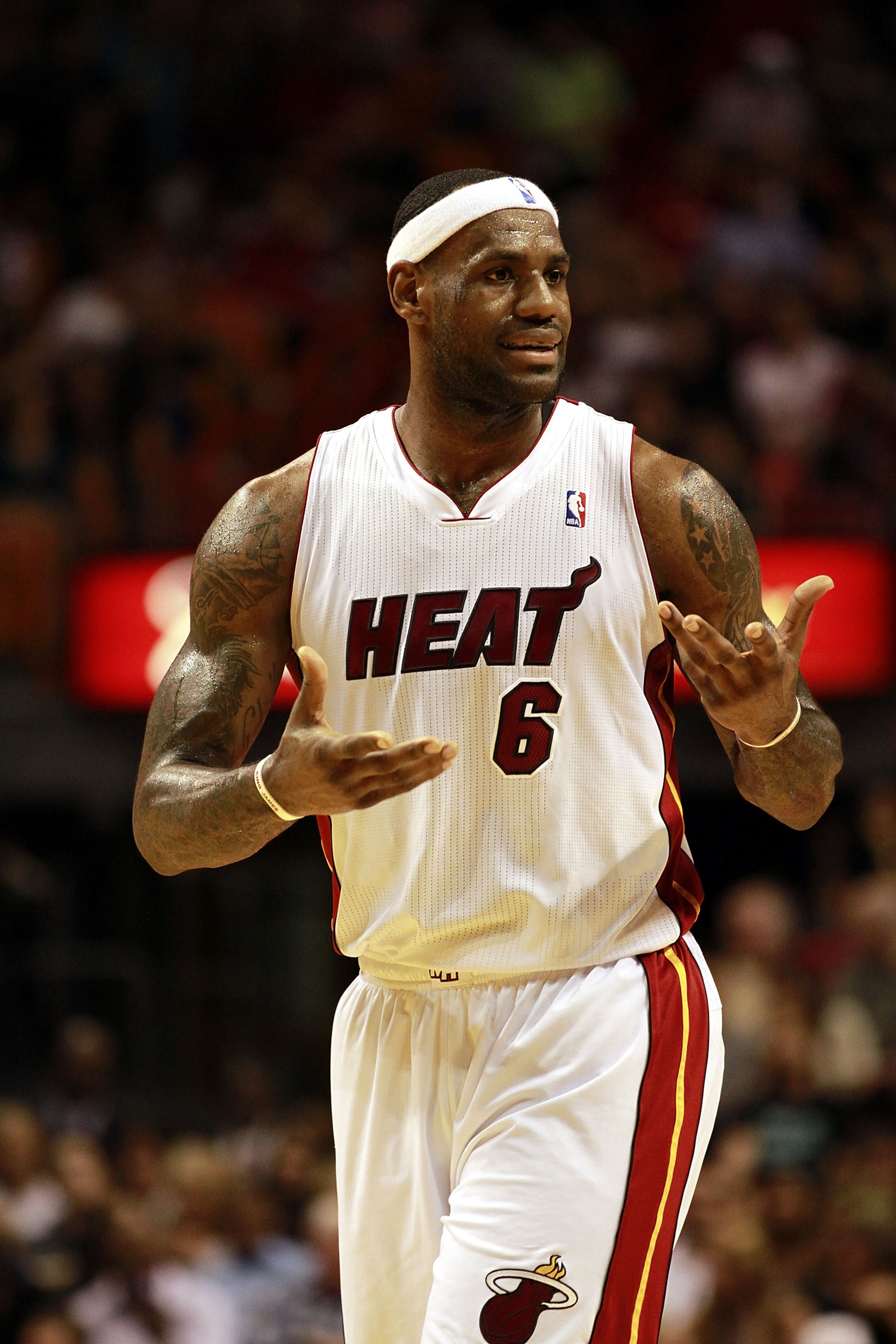 MIAMI, FL - JANUARY 01:  Forward LeBron James #6 of the Miami Heat reacts against the Golden State Warriors at American Airlines Arena on January 1, 2011 in Miami, Florida.  NOTE TO USER: User expressly acknowledges and agrees that, by downloading and/or