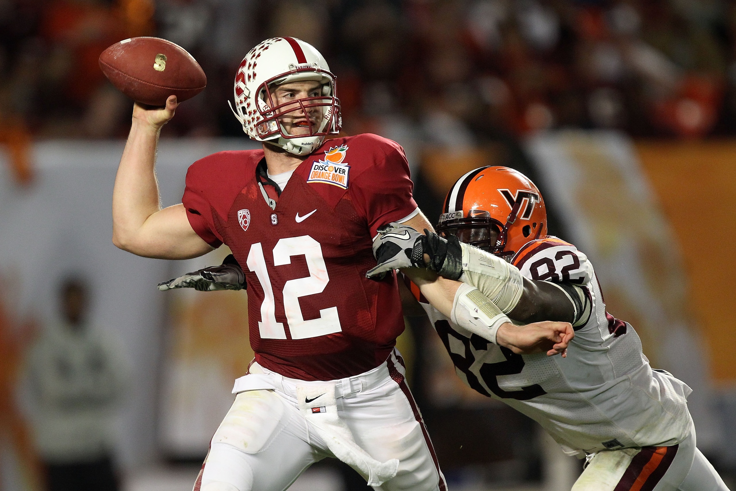 MIAMI, FL - JANUARY 03: Andrew Luck #12 of the Stanford Cardinal throws a pass against Steven Friday #82 of the Virginai Tech Hokies during the 2011 Discover Orange Bowl at Sun Life Stadium on January 3, 2011 in Miami, Florida. (Photo by Streeter Lecka/ MIAMI, FL - JANUARY 03: Andrew Luck #12 of the Stanford Cardinal throws a pass against Steven Friday #82 of the Virginai Tech Hokies during the 2011 Discover Orange Bowl at Sun Life Stadium on January 3, 2011 in Miami, Florida. (Photo by Streeter Lecka/