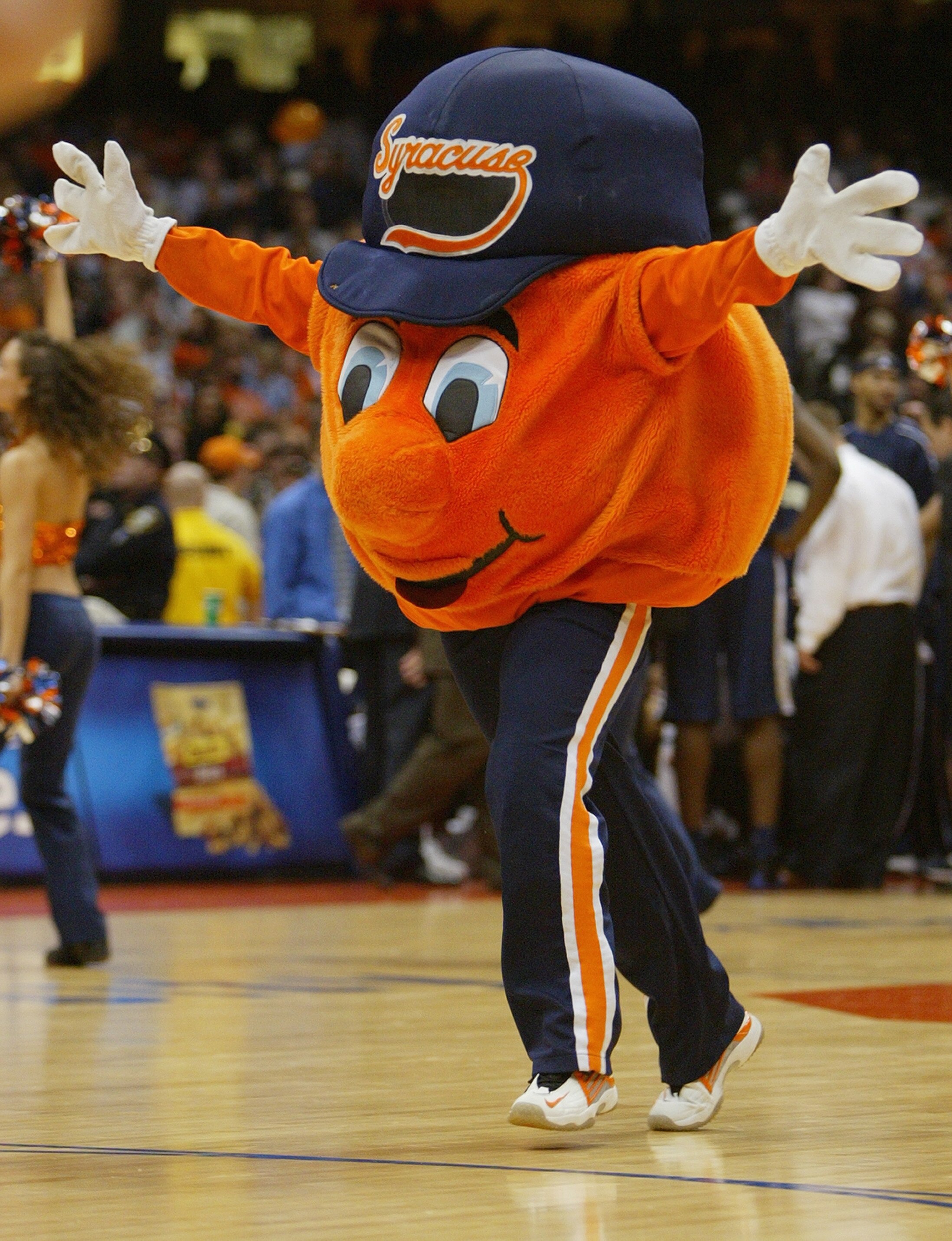 SYRACUSE, NY - JANUARY 24:  Otto the Orange, the Syracuse Orangemen mascot performs during the game against the Pittsburgh Panthers on January 24, 2004 at the Carrier Dome in Syracuse, New York. Pitt defeated the Orangeman 66-45. (Photo by Ezra Shaw/Getty