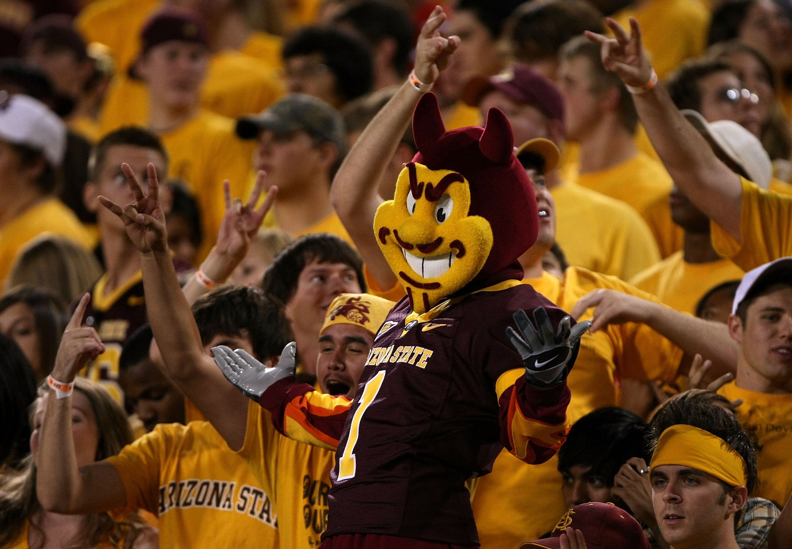 TEMPE, AZ - OCTOBER 13: 'Sparky' the Arizona State Sun Devils mascot does performs in the student section durng the game against the Washington Huskies on October 13, 2007 at Sun Devil Stadium in Tempe, Arizona. Arizona State won 44-20. (Photo by Steph TEMPE, AZ - OCTOBER 13: 'Sparky' the Arizona State Sun Devils mascot does performs in the student section durng the game against the Washington Huskies on October 13, 2007 at Sun Devil Stadium in Tempe, Arizona. Arizona State won 44-20. (Photo by Steph