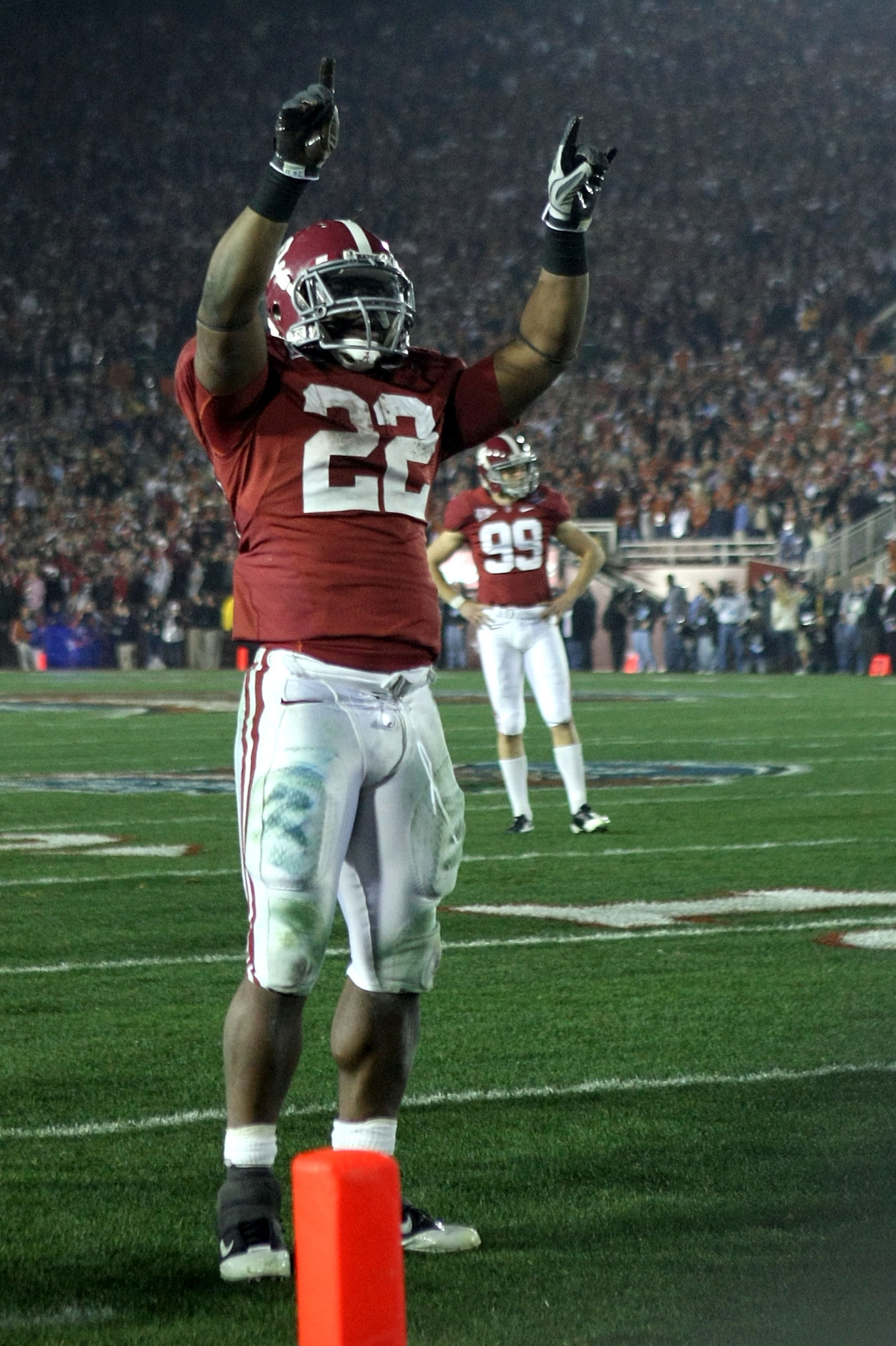 PASADENA, CA - JANUARY 07:  Running back Mark Ingram #22 of the Alabama Crimson Tide celebrates after an extra point during the Citi BCS National Championship game against the Texas Longhorns at the Rose Bowl on January 7, 2010 in Pasadena, California. Th
