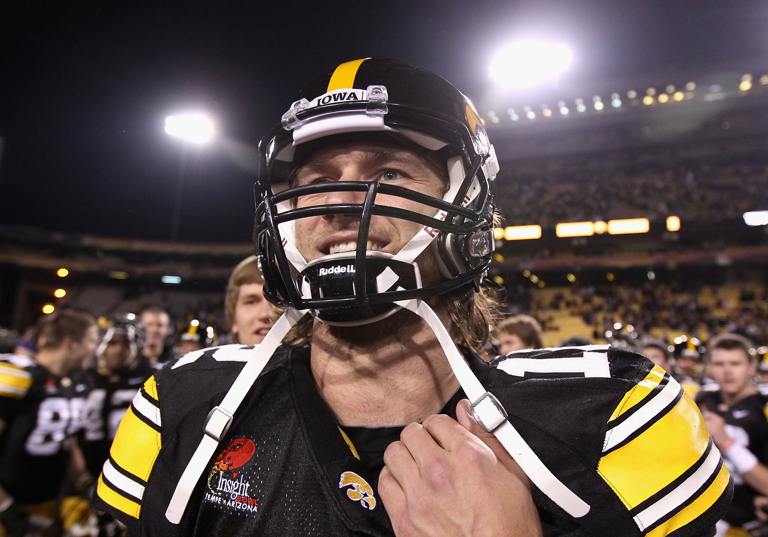 TEMPE, AZ - DECEMBER 28: Quarterback Ricky Stanzi #12 of the Iowa Hawkeyes walks off the field after defeating the Missouri Tigers in the Insight Bowl at Sun Devil Stadium on December 28, 2010 in Tempe, Arizona. The Hawkeyes defeated the Tigers 27-24. ( TEMPE, AZ - DECEMBER 28: Quarterback Ricky Stanzi #12 of the Iowa Hawkeyes walks off the field after defeating the Missouri Tigers in the Insight Bowl at Sun Devil Stadium on December 28, 2010 in Tempe, Arizona. The Hawkeyes defeated the Tigers 27-24. (