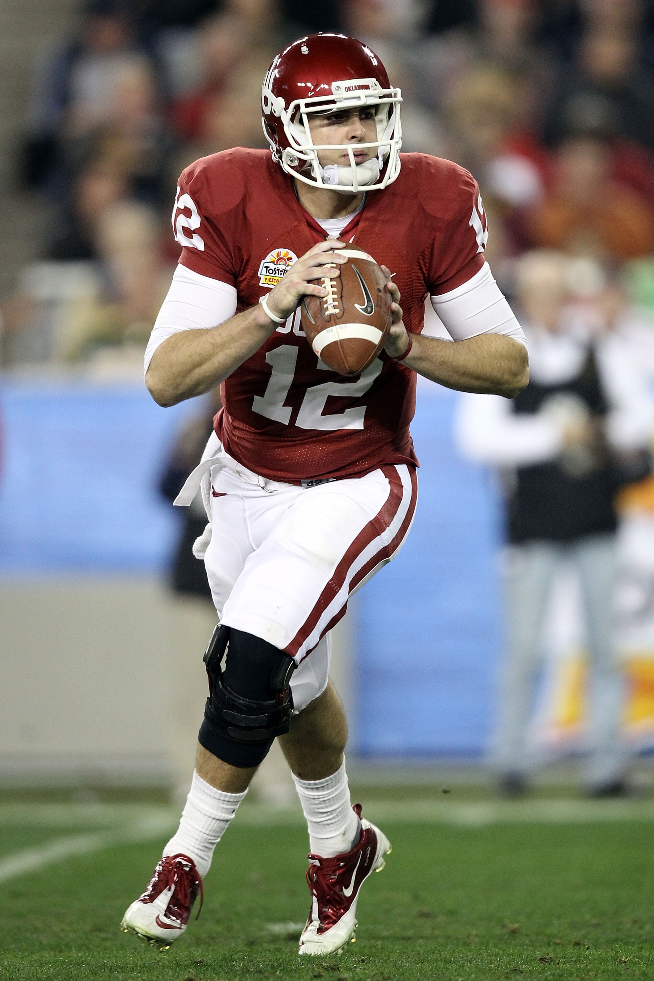 GLENDALE, AZ - JANUARY 01: Landry Jones #12 of the Oklahoma Sooners throws the ball against the Connecticut Huskies during the Tostitos Fiesta Bowl at the Universtity of Phoenix Stadium on January 1, 2011 in Glendale, Arizona. (Photo by Christian Peters GLENDALE, AZ - JANUARY 01: Landry Jones #12 of the Oklahoma Sooners throws the ball against the Connecticut Huskies during the Tostitos Fiesta Bowl at the Universtity of Phoenix Stadium on January 1, 2011 in Glendale, Arizona. (Photo by Christian Peters