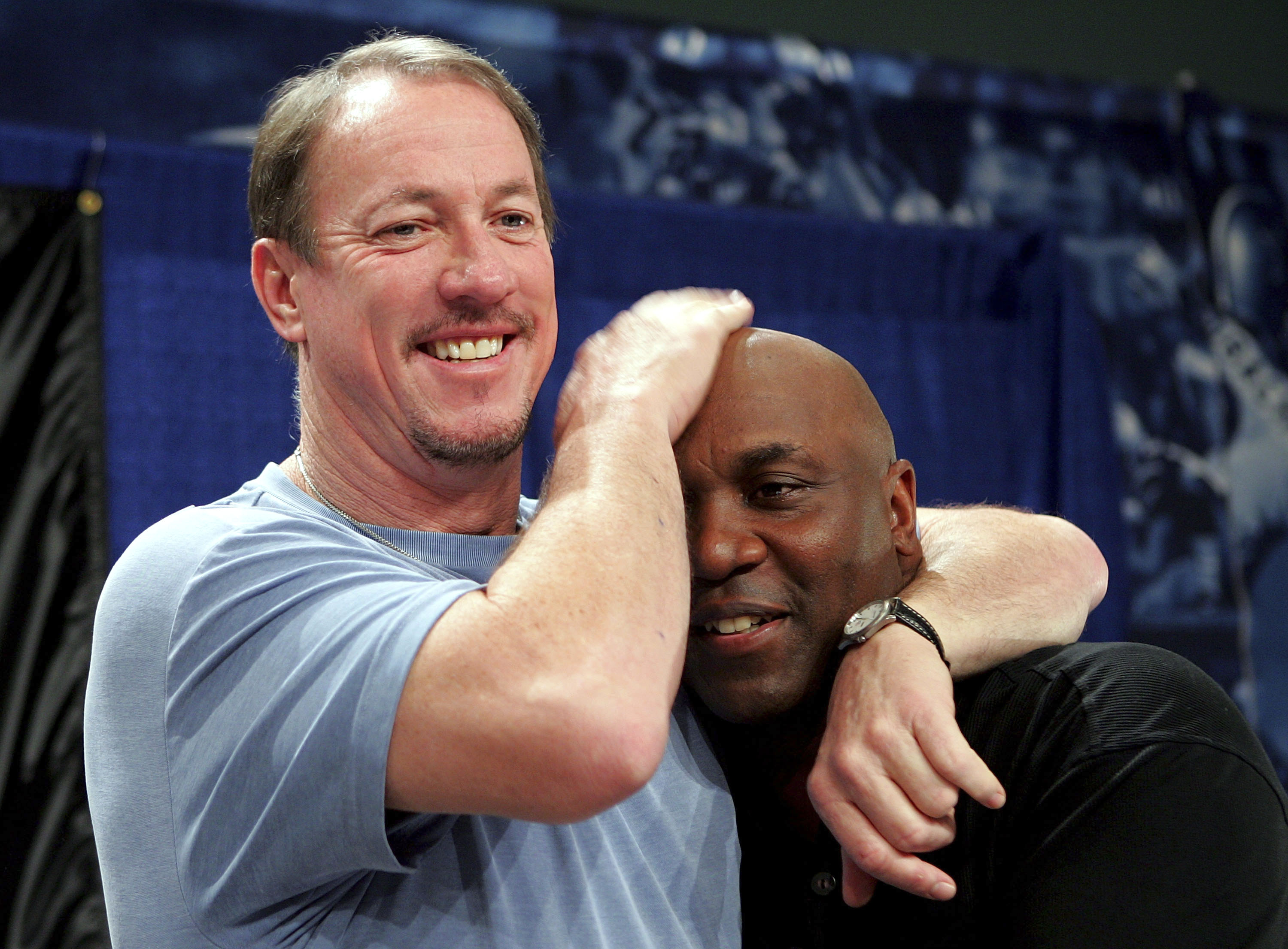 MIAMI - FEBRUARY 03:  (L-R) Former player Jim Kelly congratulates former teammate Hall of Fame inductee Thurman Thomas formerly of the Buffalo Bills during the Super Bowl XLI Pro Football Hall of Fame Press Conference at the Miami Convention Center on Feb