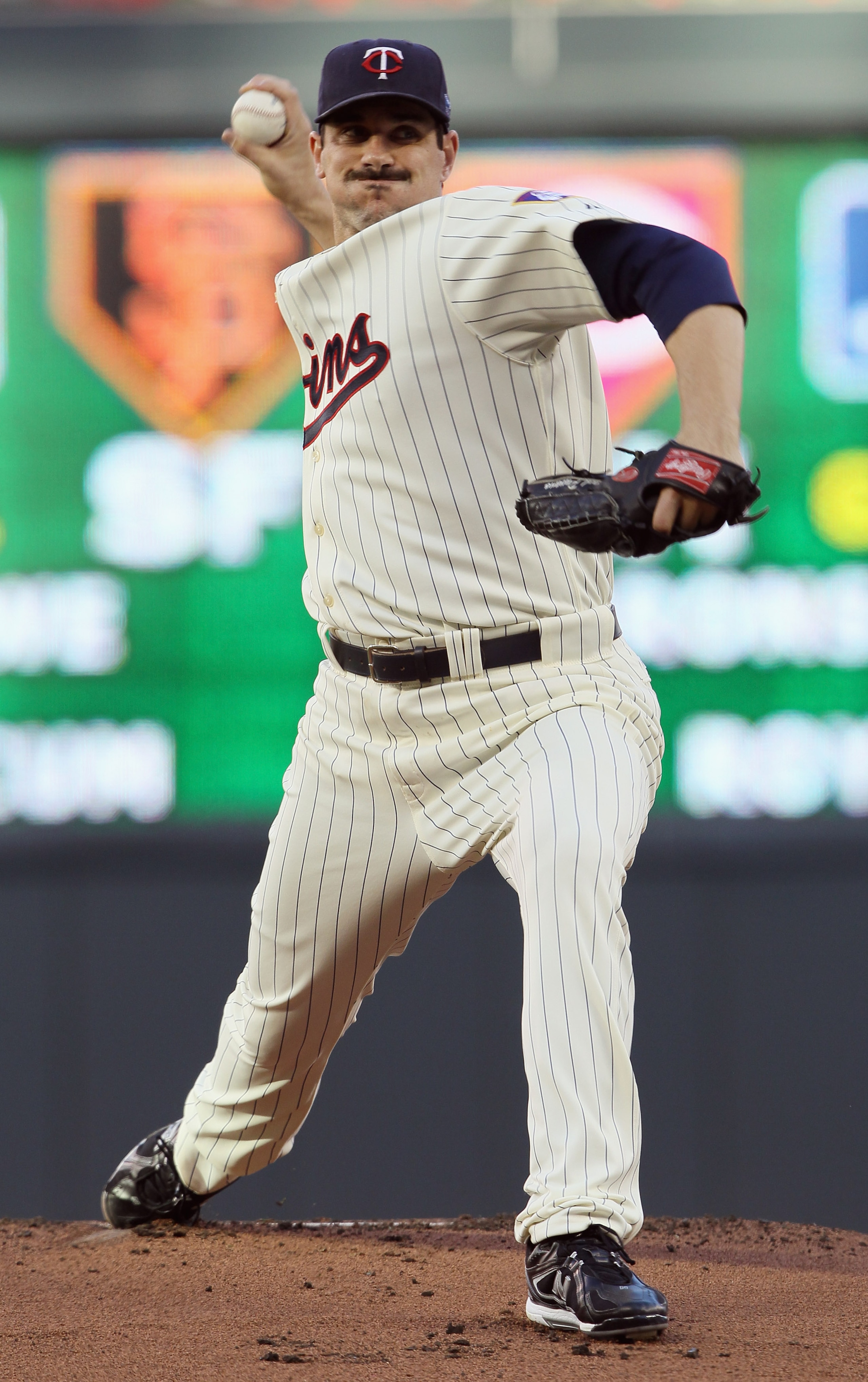 MINNEAPOLIS - OCTOBER 07:  Carl Pavano #48 of the Minnesota Twins delivers a pitch in the first inning against the New York Yankees during game two of the ALDS on October 7, 2010 at Target Field in Minneapolis, Minnesota.  (Photo by Elsa/Getty Images)