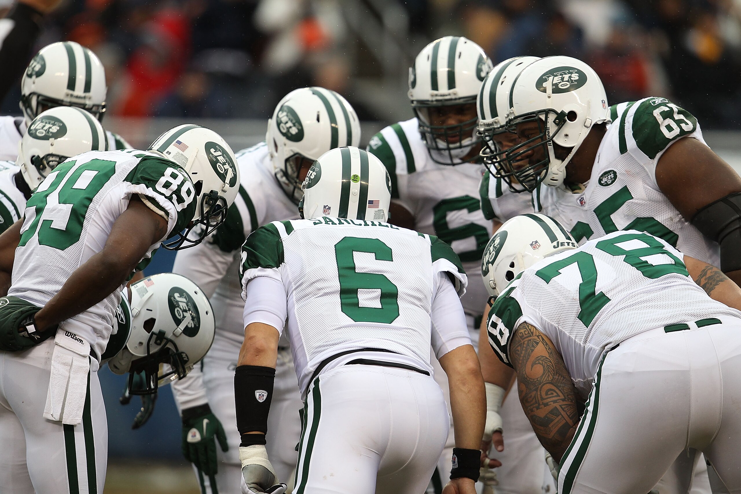 CHICAGO, IL - DECEMBER 26: Mark Sanchez #6 of the New York Jets calls a play in the huddle against the Chicago Bears at Soldier Field on December 26, 2010 in Chicago, Illinois. The Bears defeated the Jets 38-34. (Photo by Jonathan Daniel/Getty Images)