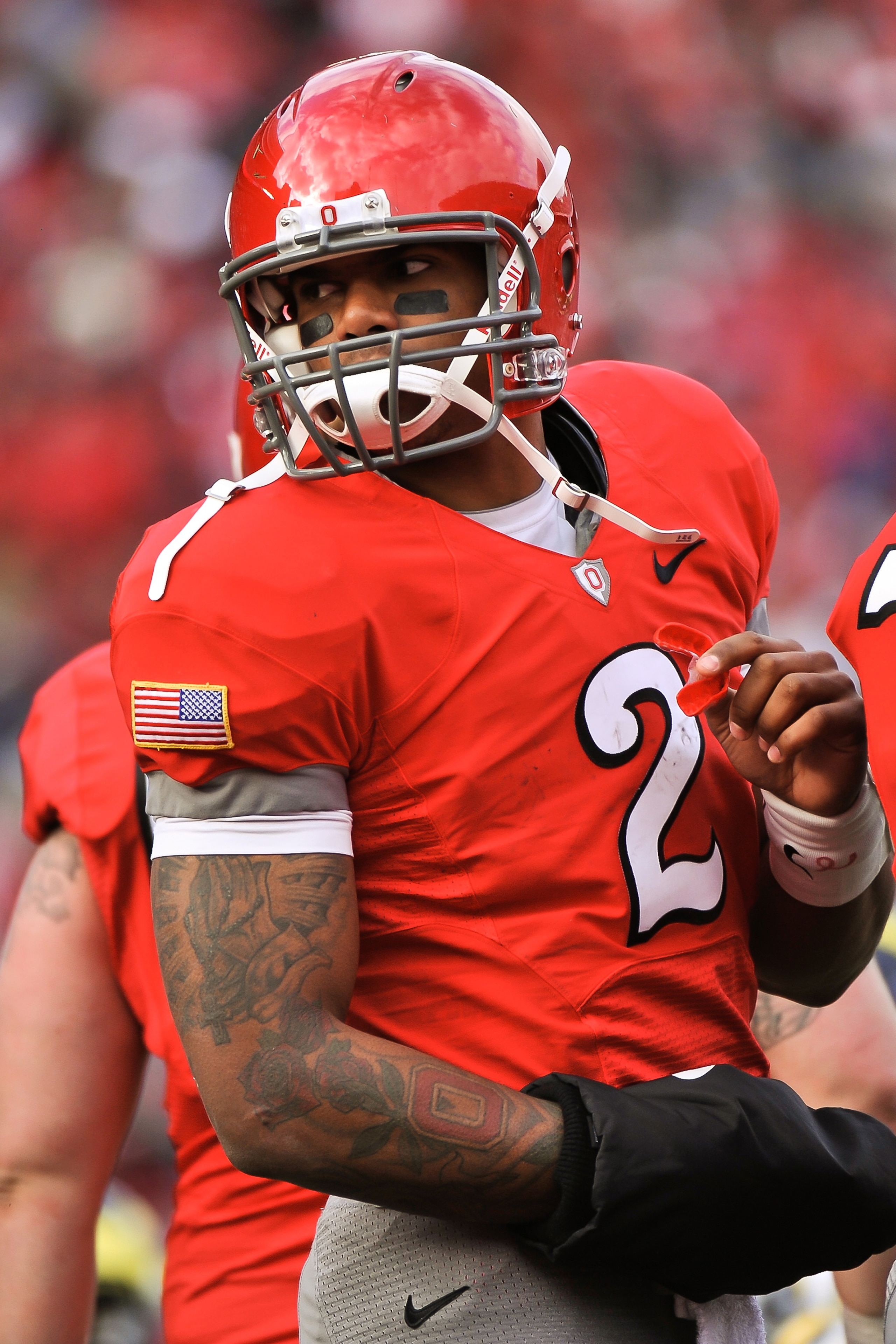 COLUMBUS, OH - NOVEMBER 27:  Quarterback Terrelle Pryor #2 of the Ohio State Buckeyes gets ready to call the play in the huddle against the Michigan Wolverines at Ohio Stadium on November 27, 2010 in Columbus, Ohio.  (Photo by Jamie Sabau/Getty Images)