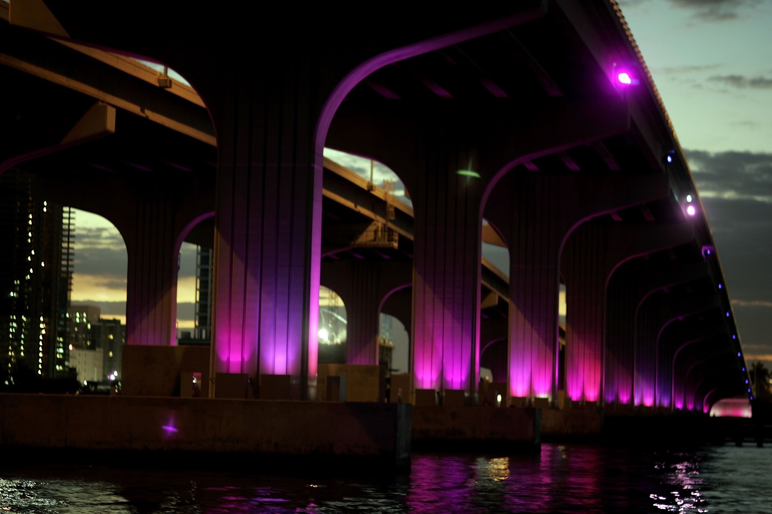 MIAMI - JANUARY 18:  Colorful lights adorne a bridge as the city of Miami continues to prepare to host Super Bowl XLI, January 18, 2007 in Miami, Florida. 75,000 fans are expected to pack into Dolphin Stadium for the game and pump money into the local eco