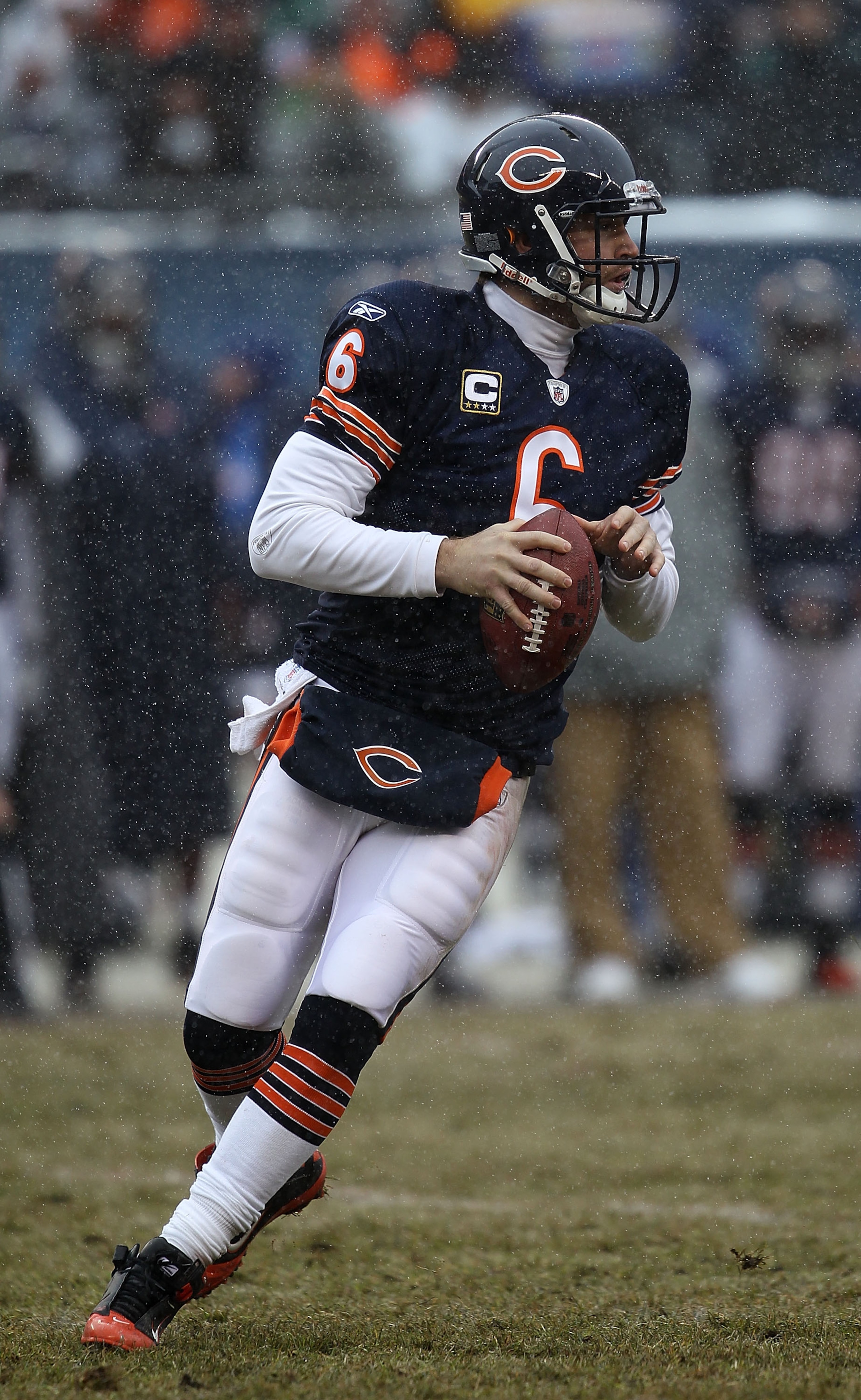 CHICAGO, IL - DECEMBER 26: Jay Cutler #6 of the Chicago Bears looks for a receiver against the New York Jets at Soldier Field on December 26, 2010 in Chicago, Illinois. The Bears defeated the Jets 38-34. (Photo by Jonathan Daniel/Getty Images)