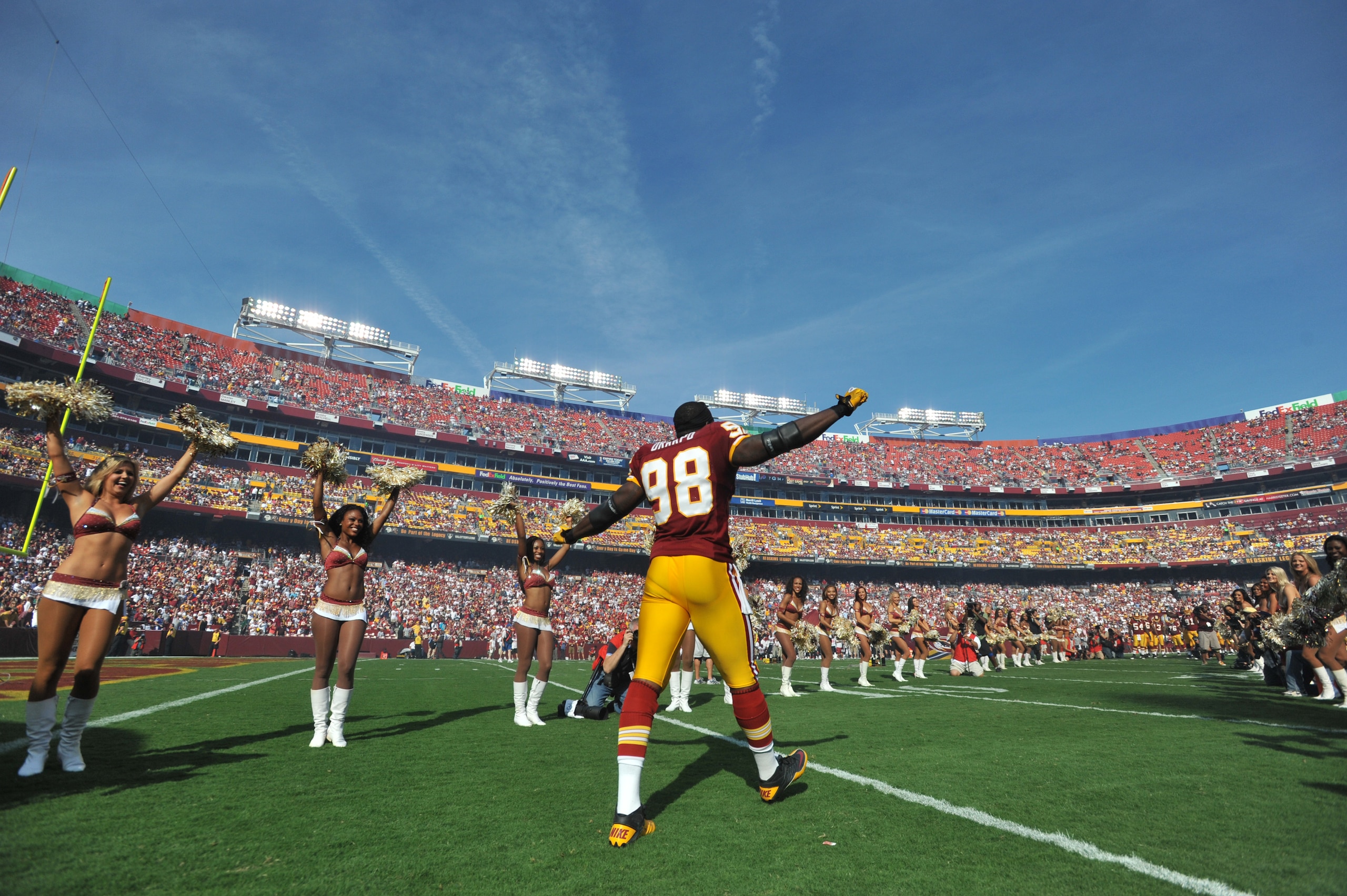 LANDOVER - SEPTEMBER 19:  Brian Orakpo #98 of the Washington Redskins is introduced before the game against the Houston Texans at FedExField on September 19, 2010 in Landover, Maryland. The Texans defeated the Redskins in overtime 30-27. (Photo by Larry F