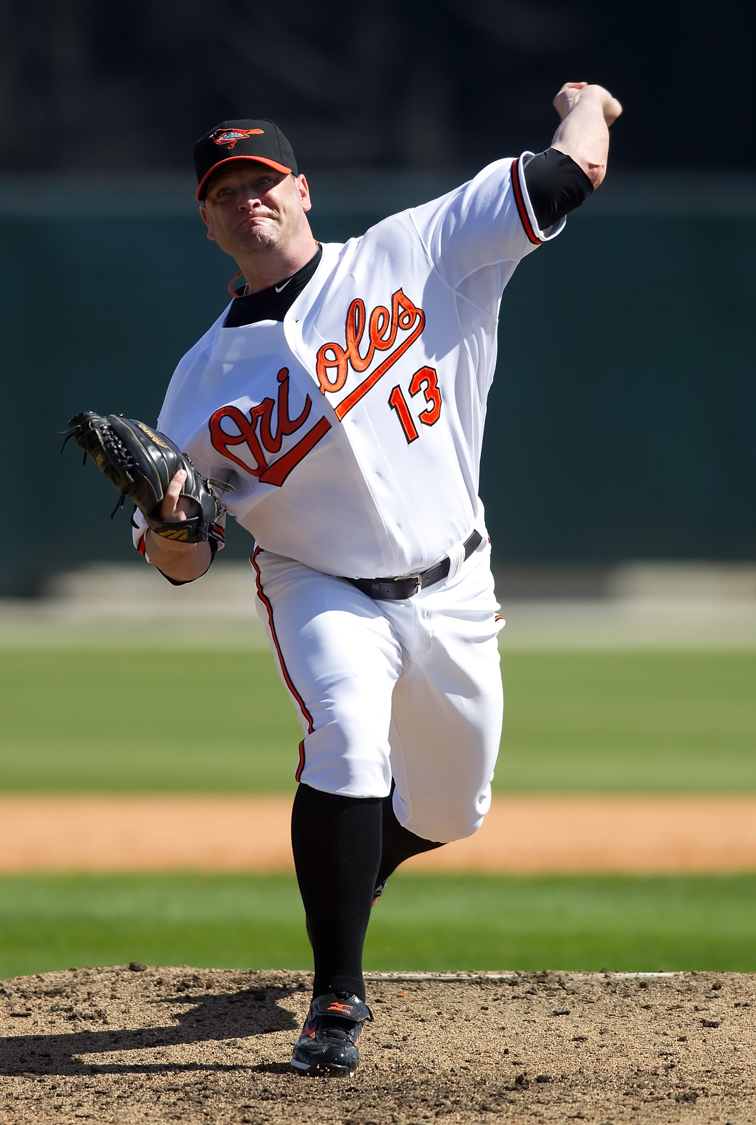 SARASOTA, FL - MARCH 07:  Pitcher Will Ohman #13 of the Baltimore Orioles pitches against the Boston Red Sox during a Grapefruit League Spring Training Game at Ed Smith Stadium on March 7, 2010 in Sarasota, Florida.  (Photo by J. Meric/Getty Images)