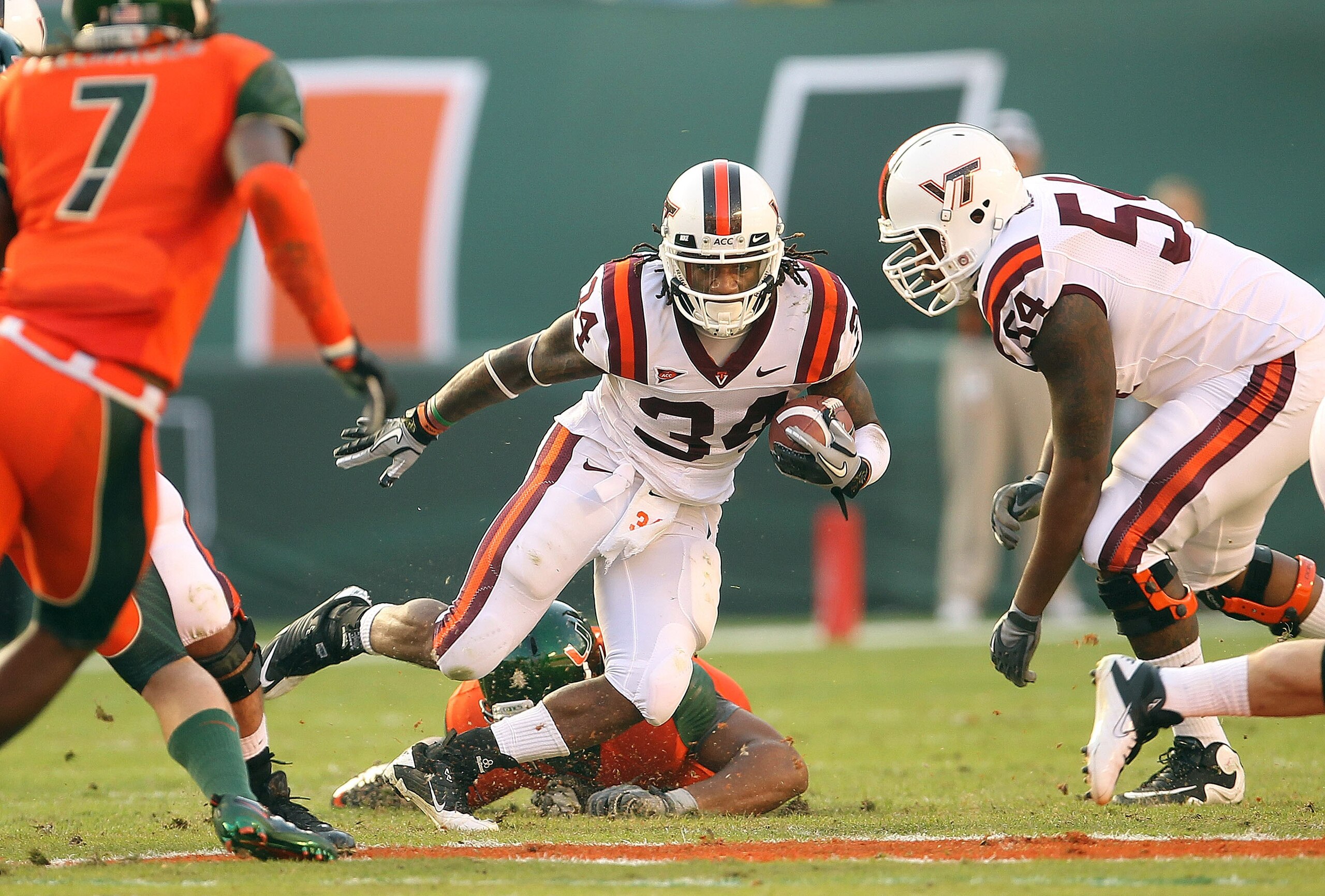 MIAMI - NOVEMBER 20:  Ryan Williams #34 of the Virginia Tech Hokies runs for a first down during a game against the Miami Hurricanes at Sun Life Stadium on November 20, 2010 in Miami, Florida.  (Photo by Mike Ehrmann/Getty Images)