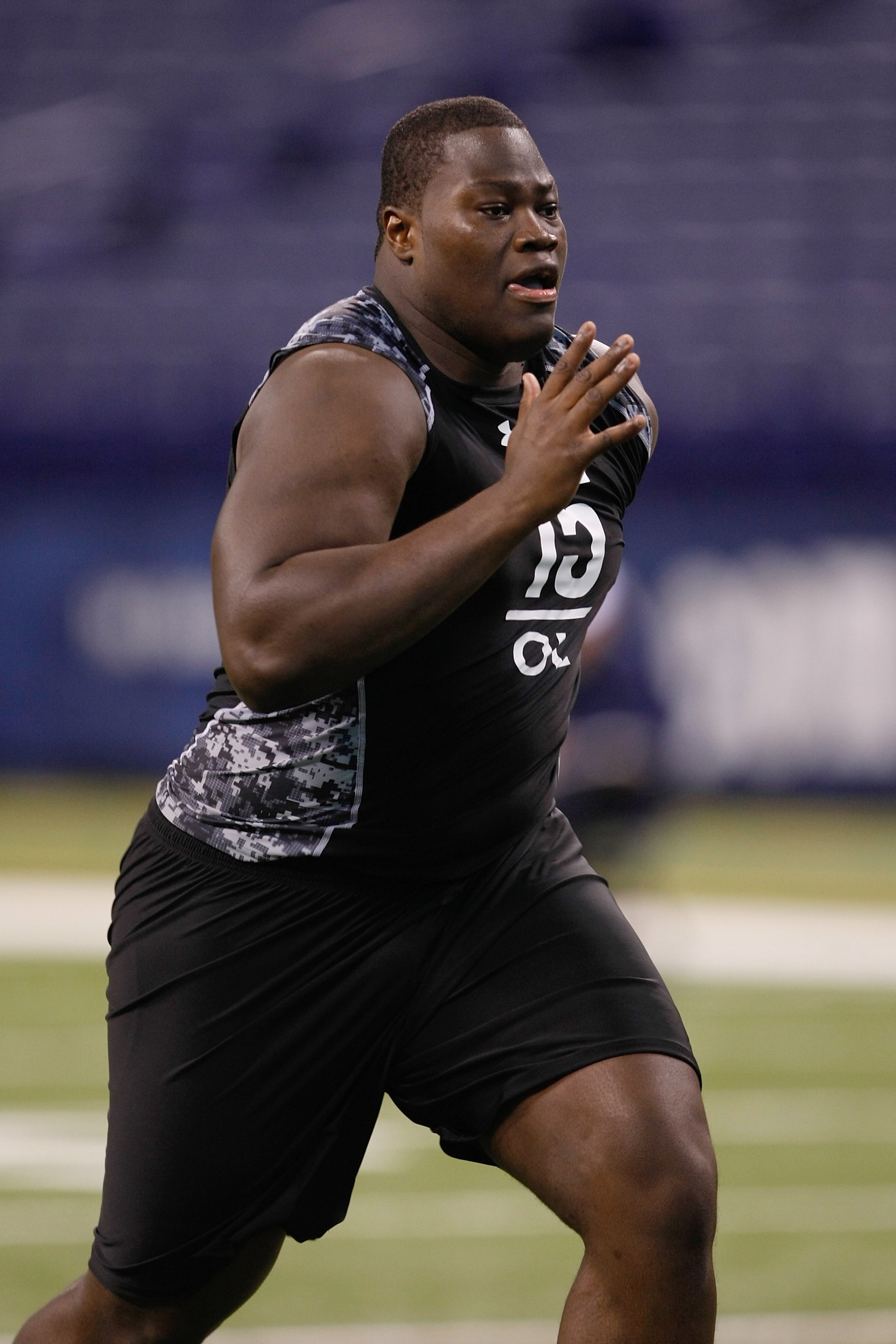 INDIANAPOLIS, IN - FEBRUARY 27: Offensive lineman Vladimir Ducasse of Massachusetts-Amherst runs during the NFL Scouting Combine presented by Under Armour at Lucas Oil Stadium on February 27, 2010 in Indianapolis, Indiana. (Photo by Scott Boehm/Getty Imag