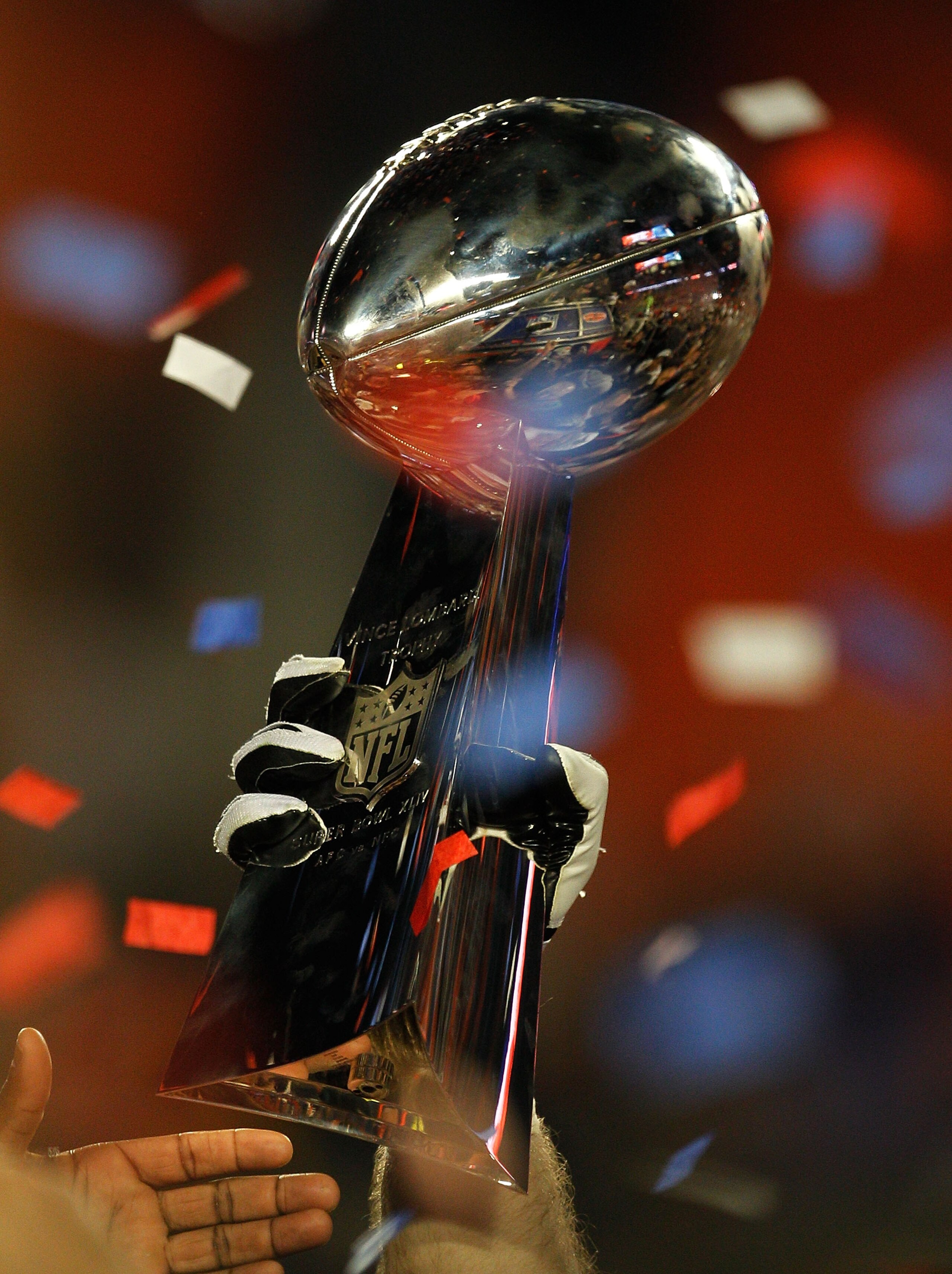 MIAMI GARDENS, FL - FEBRUARY 07:  A detail of the Vince Lombardi Trophy as the New Orleans Saints celebrate after defeating the Indianapolis Colts during Super Bowl XLIV on February 7, 2010 at Sun Life Stadium in Miami Gardens, Florida.  (Photo by Jonatha