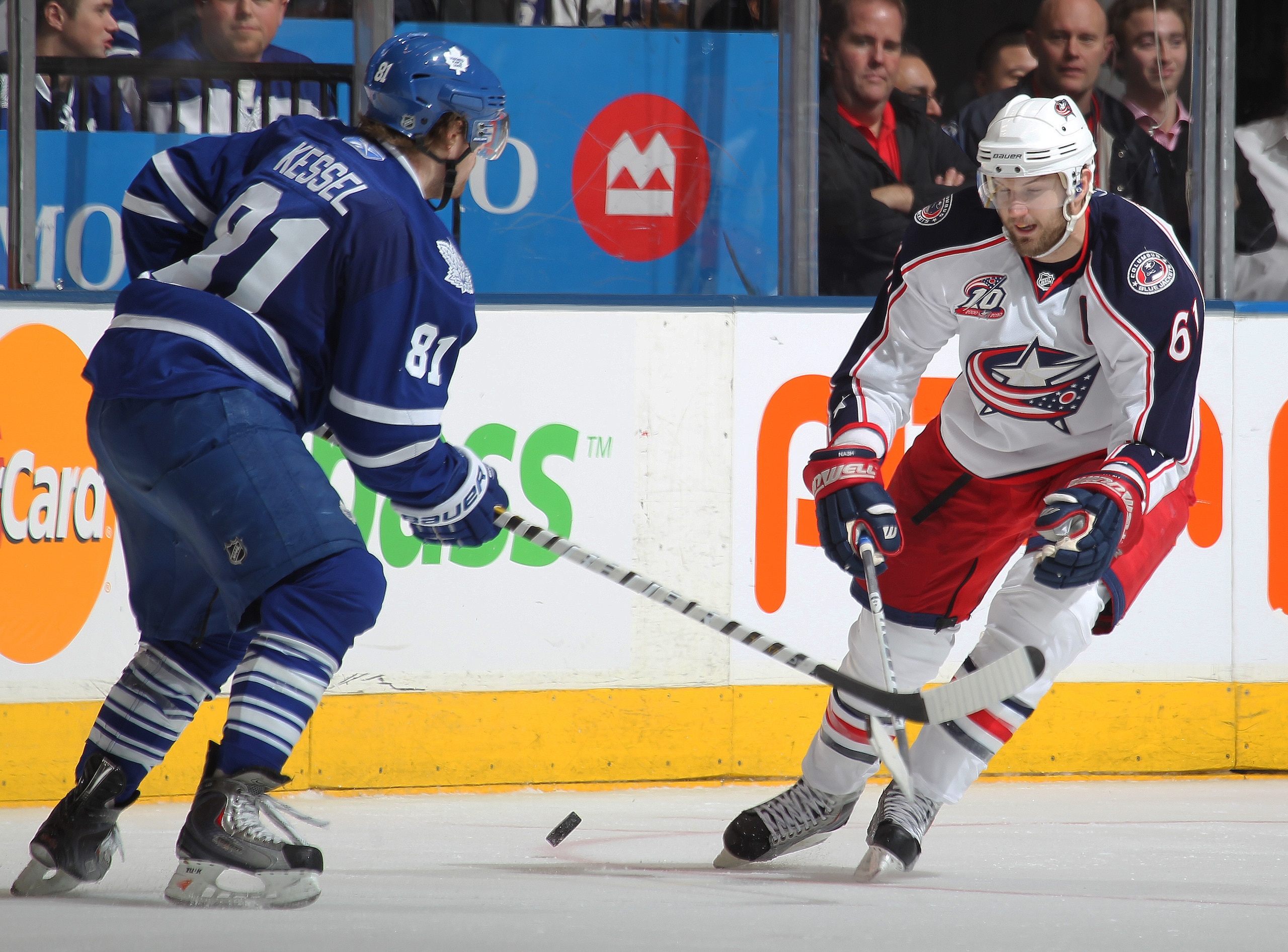 TORONTO, CANADA - DECEMBER 30:  Rick Nash #61 of the Columbus Blue Jackets blocks a shot by Phil Kessel #81 of the Toronto Maple Leafs in a game on December 30, 2010 at the Air Canada Centre in Toronto, Canada. The Blue Jackets defeated the Leafs 3-2. (Ph