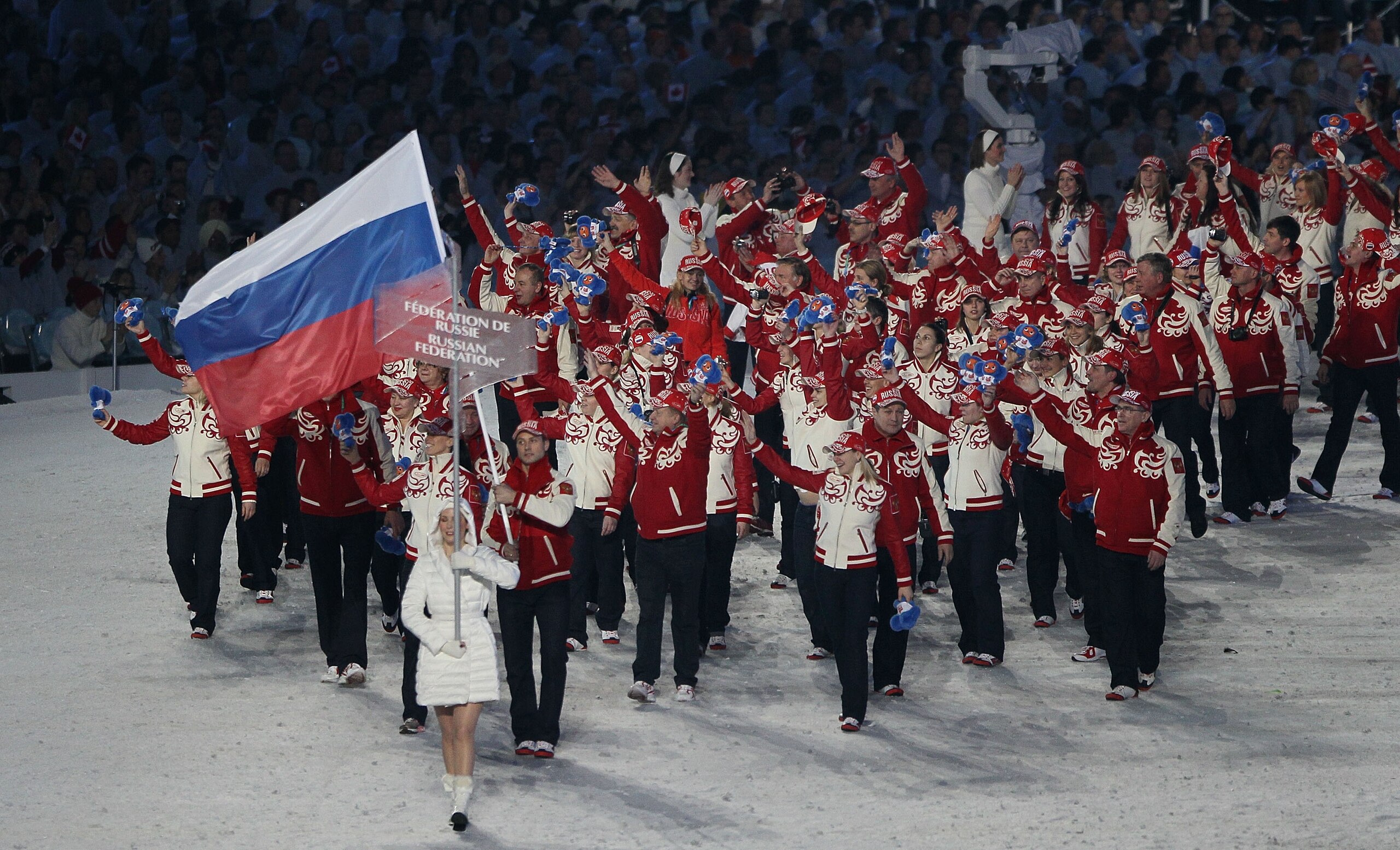 VANCOUVER, BC - FEBRUARY 12:  Alexey Morozov of Russia carries the flag during the Opening Ceremony of the 2010 Vancouver Winter Olympics at BC Place on February 12, 2010 in Vancouver, Canada.  (Photo by Bruce Bennett/Getty Images)
