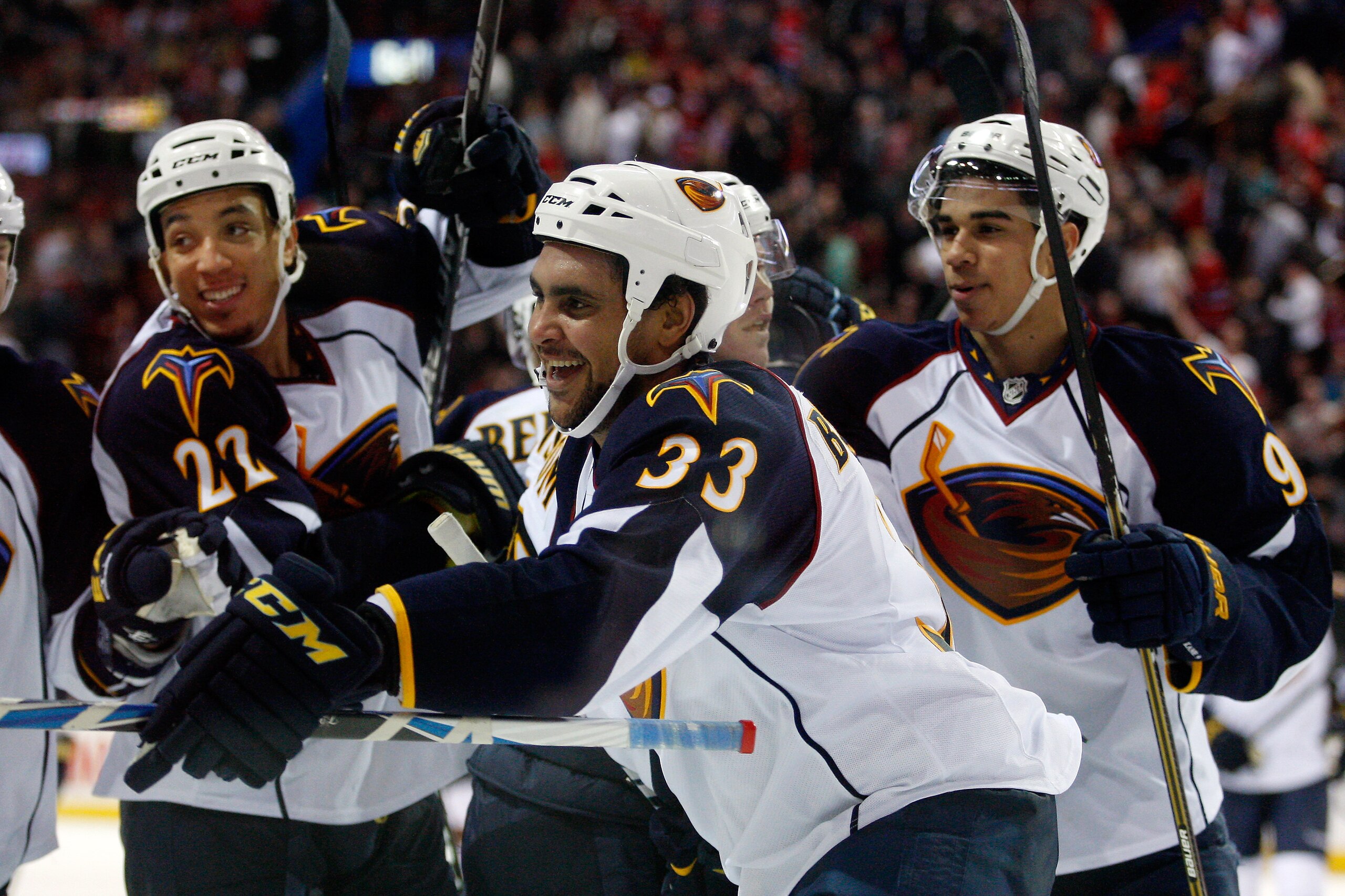 MONTREAL, CANADA - JANUARY 2:  Dustin Byfuglien #33 of the Atlanta Thrashers celebrates his overtime goal with team mates during the NHL game against the Montreal Canadiens at the Bell Centre on January 2, 2011 in Montreal, Quebec, Canada.  The Thrashers