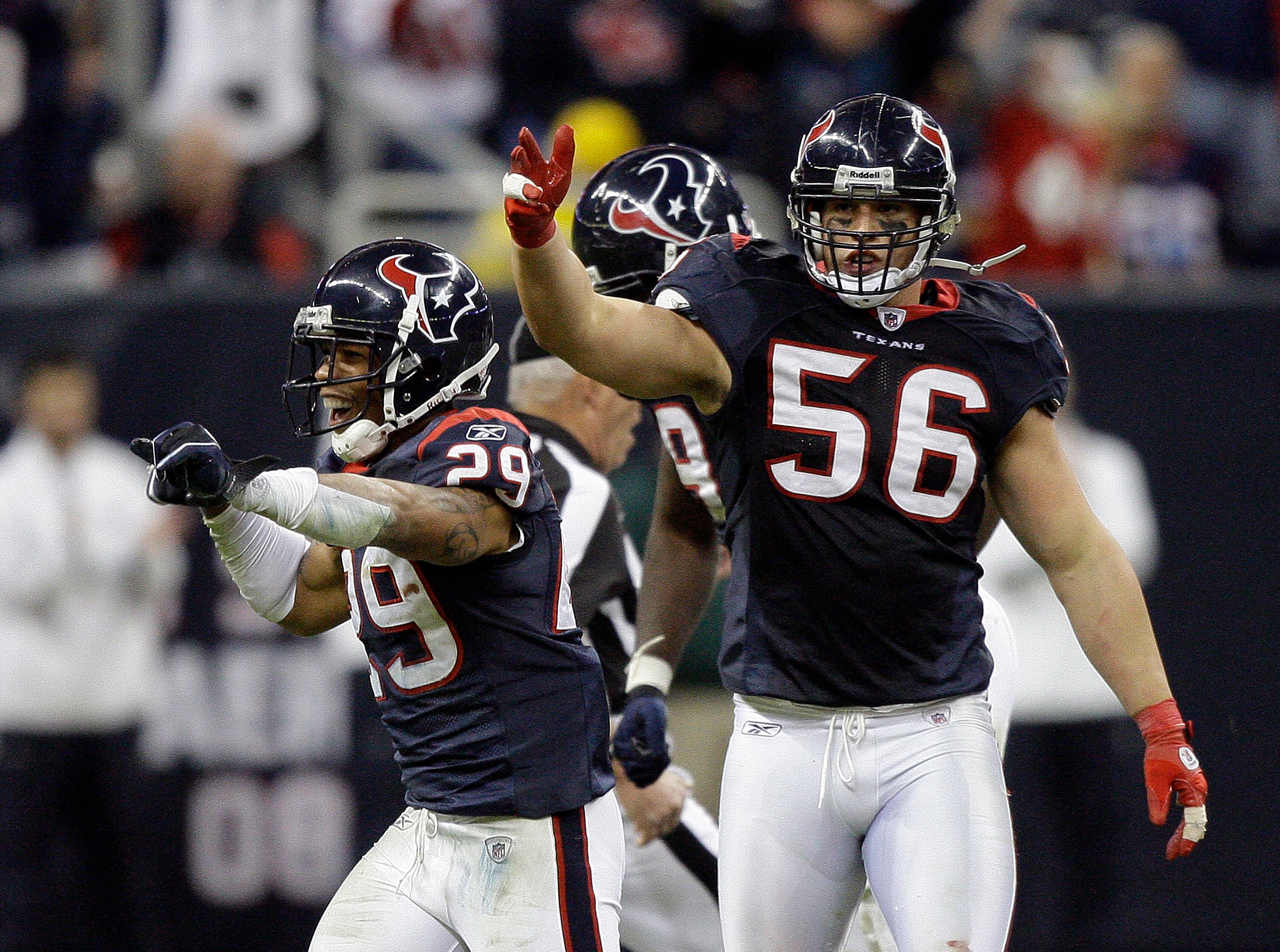 HOUSTON - JANUARY 02: Glover Quin #29 of the Houston Texans and Brian Cushing #56 celebrate after recovering a fumble late in the fourth quarter against the Jacksonville Jaguars at Reliant Stadium on January 2, 2011 in Houston, Texas. (Photo by Bob Lev HOUSTON - JANUARY 02: Glover Quin #29 of the Houston Texans and Brian Cushing #56 celebrate after recovering a fumble late in the fourth quarter against the Jacksonville Jaguars at Reliant Stadium on January 2, 2011 in Houston, Texas. (Photo by Bob Lev