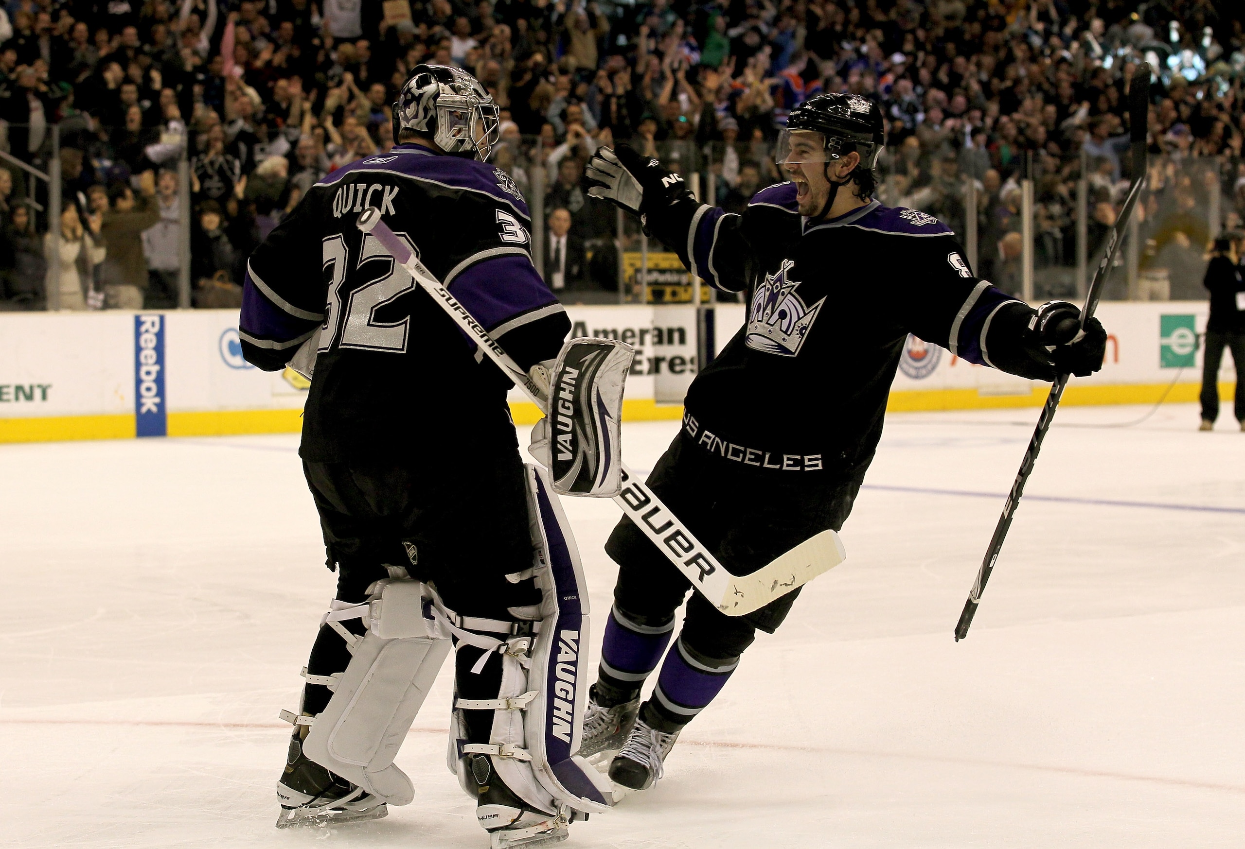 LOS ANGELES, CA - DECEMBER 23:  Drew Doughty #8 of the Los Angeles Kings congratulates goaltender Jonathan Quick #32 after Quick stopped the final shot to secure the win in a shootout against the Edmonton Oilers at Staples Center on December 23, 2010 in L