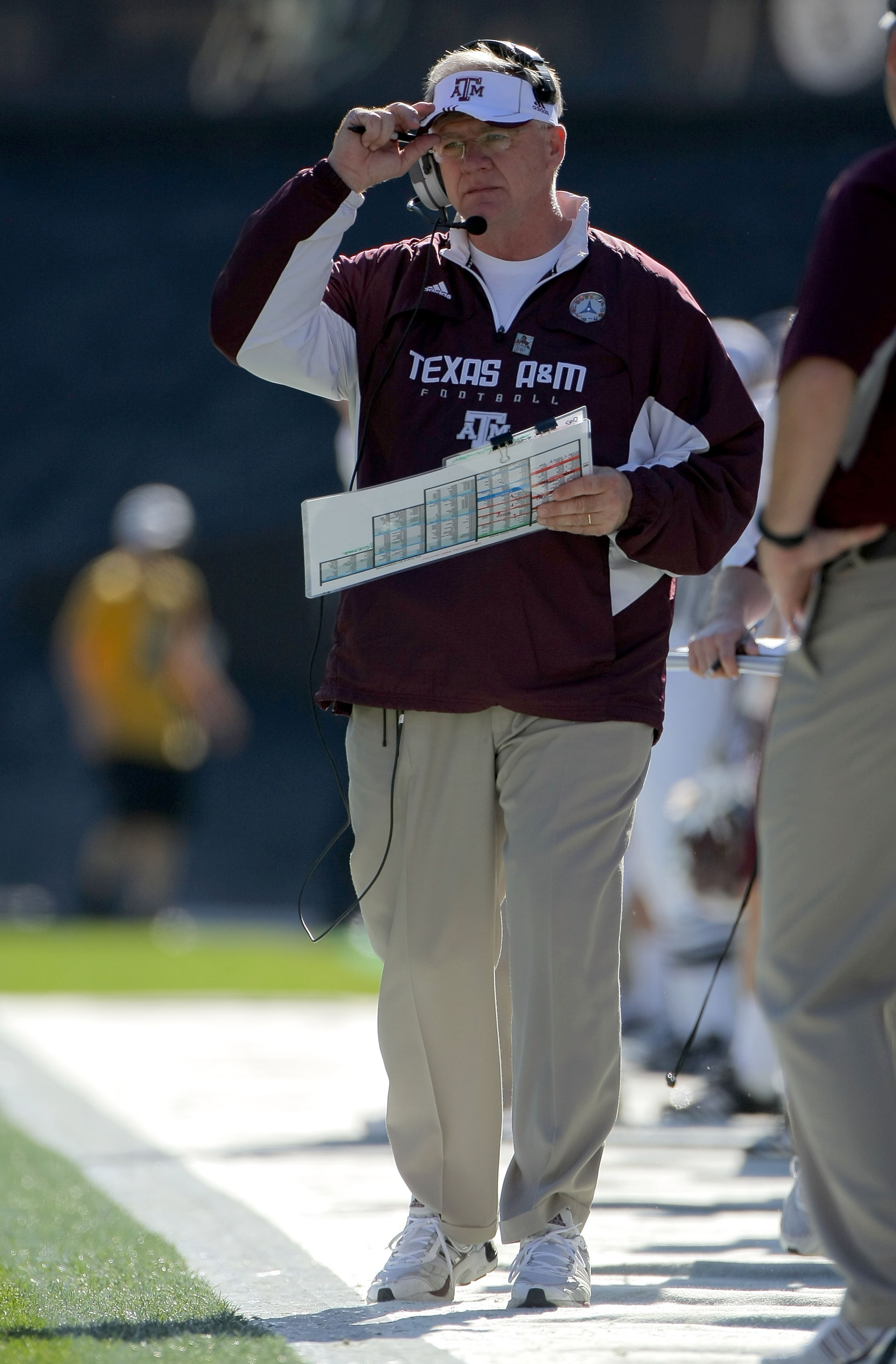 BOULDER, CO - NOVEMBER 07:  Head coach Mike Sherman of the Texas A&M Aggies leads his team against the Colorado Buffaloes during NCAA college football action at Folsom Field on November 7, 2009 in Boulder, Colorado. Colorado defeated Texas A&M 35-34.  (Ph