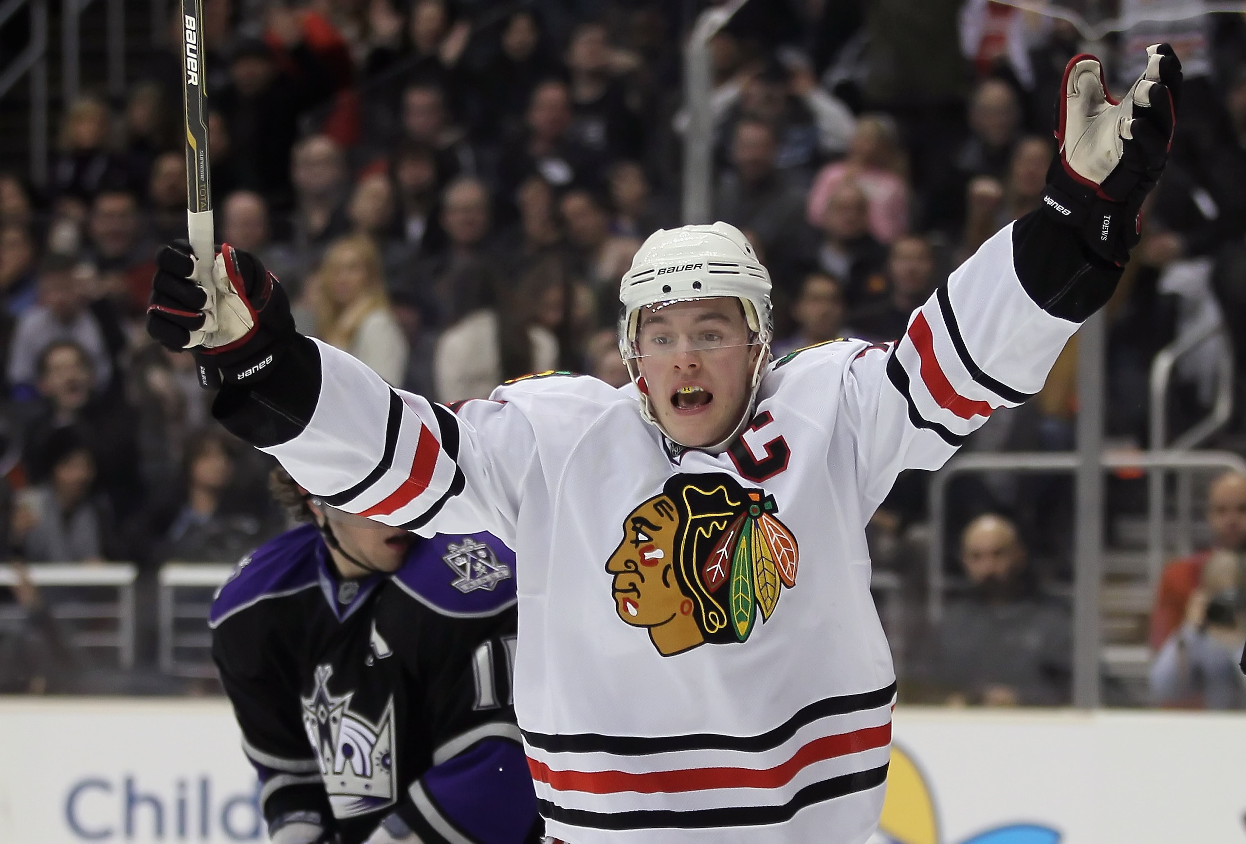 LOS ANGELES, CA - JANUARY 03: Jonathan Toews #19 of the Chicago Blackhawks celebrates a goal in the third period goal against the Los Angeles Kings at Staples Center on January 3, 2011 in Los Angeles, California. The Blackhawks defeated the Kings 4-3. ( LOS ANGELES, CA - JANUARY 03: Jonathan Toews #19 of the Chicago Blackhawks celebrates a goal in the third period goal against the Los Angeles Kings at Staples Center on January 3, 2011 in Los Angeles, California. The Blackhawks defeated the Kings 4-3. (