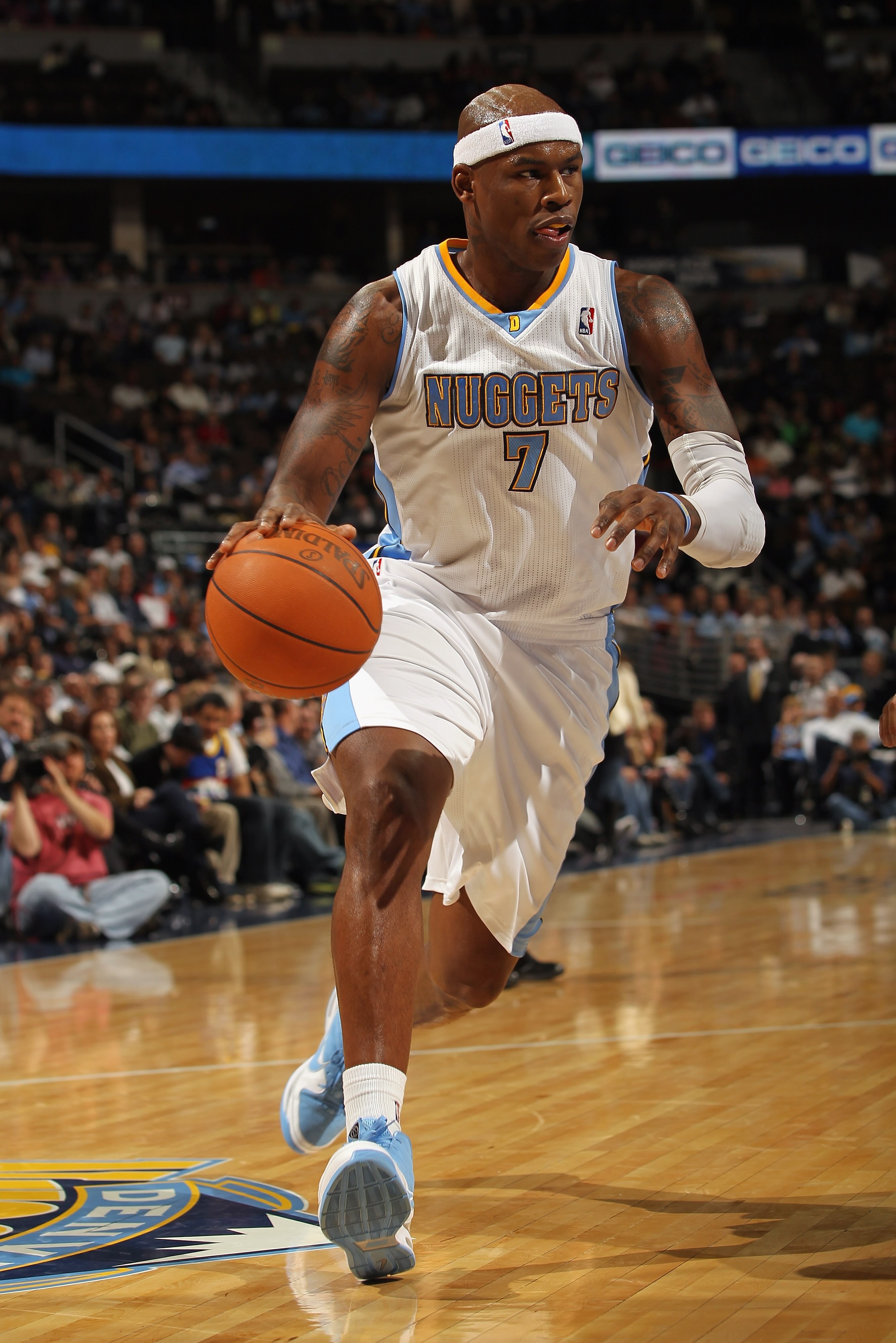 DENVER - NOVEMBER 16: Al Harrington #7 of the Denver Nuggets dribbles the ball against the New York Knicks at the Pepsi Center on November 16, 2010 in Denver, Colorado. The Nuggets defeated the Knicks 120-118. NOTE TO USER: User expressly acknowledges an DENVER - NOVEMBER 16: Al Harrington #7 of the Denver Nuggets dribbles the ball against the New York Knicks at the Pepsi Center on November 16, 2010 in Denver, Colorado. The Nuggets defeated the Knicks 120-118. NOTE TO USER: User expressly acknowledges an