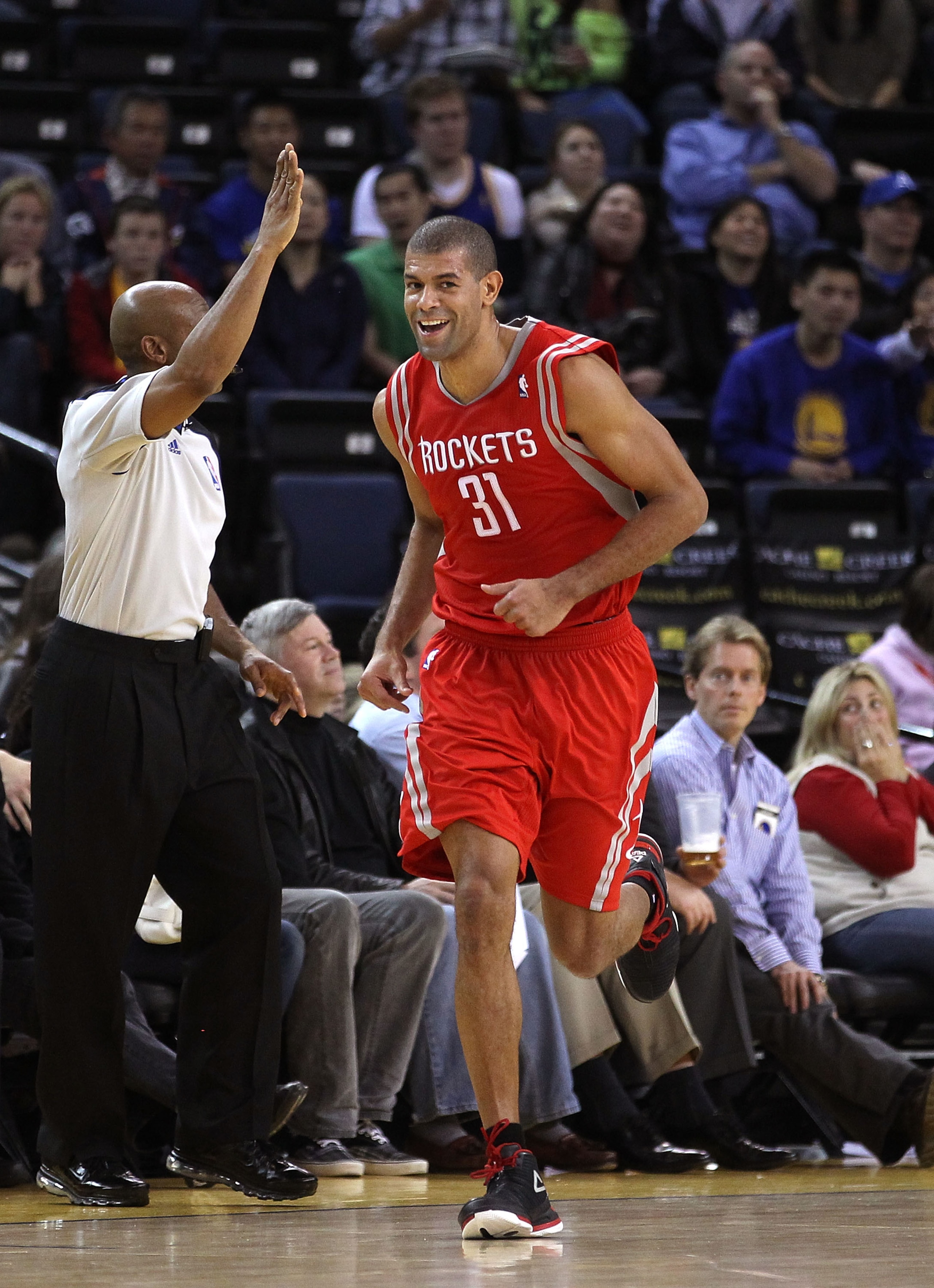 OAKLAND, CA - DECEMBER 20: Shane Battier #31 of the Houston Rockets smiles as he runs back down the court after making a three-point basket against the Golden State Warriors at Oracle Arena on December 20, 2010 in Oakland, California. NOTE TO USER: User OAKLAND, CA - DECEMBER 20: Shane Battier #31 of the Houston Rockets smiles as he runs back down the court after making a three-point basket against the Golden State Warriors at Oracle Arena on December 20, 2010 in Oakland, California. NOTE TO USER: User