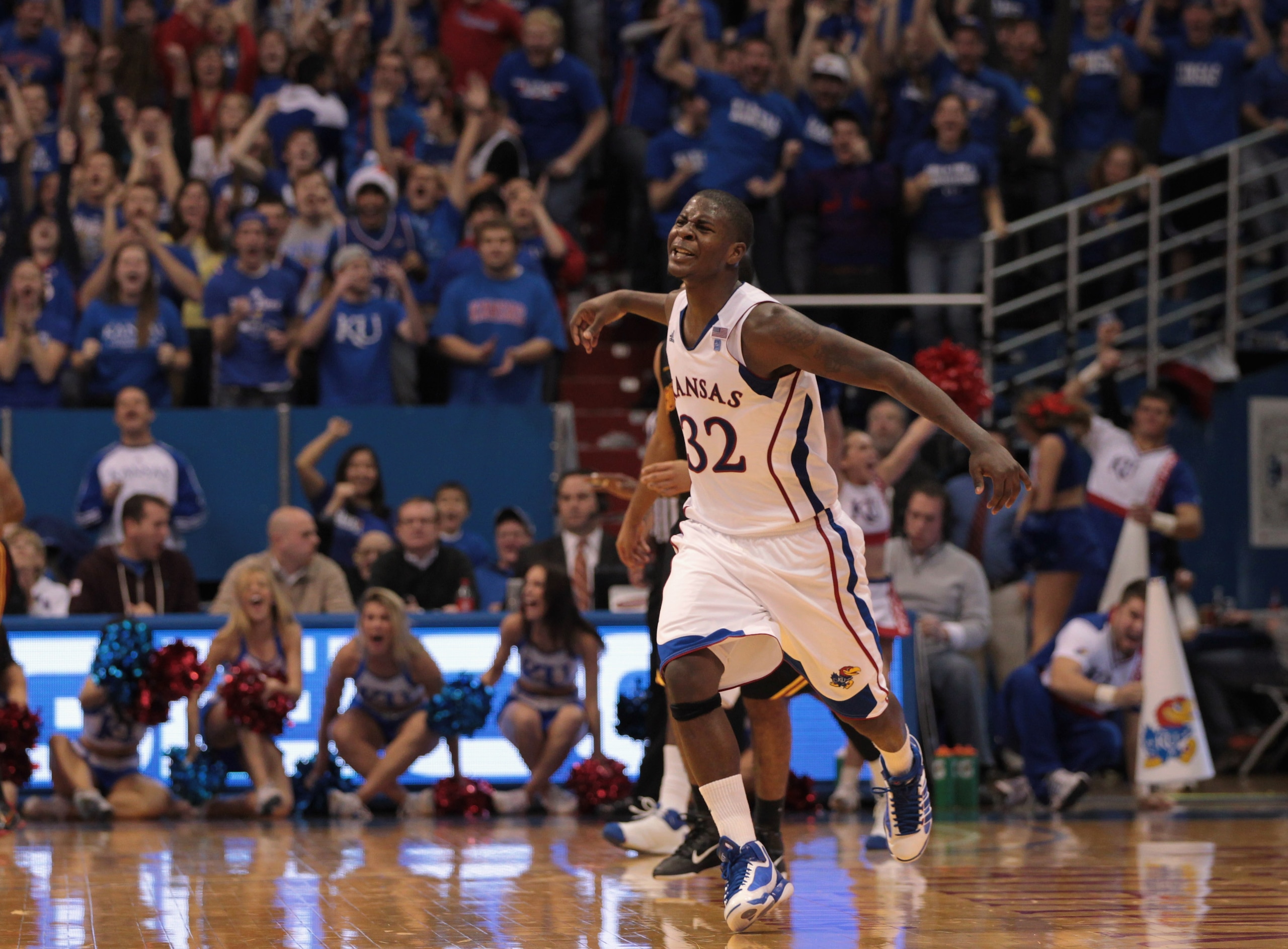 LAWRENCE, KS - DECEMBER 18:  Josh Selby #32 of the Kansas Jayhawks reacts after scoring during the game against the USC Trojans on December 18, 2010 at Allen Fieldhouse in Lawrence, Kansas.  (Photo by Jamie Squire/Getty Images)