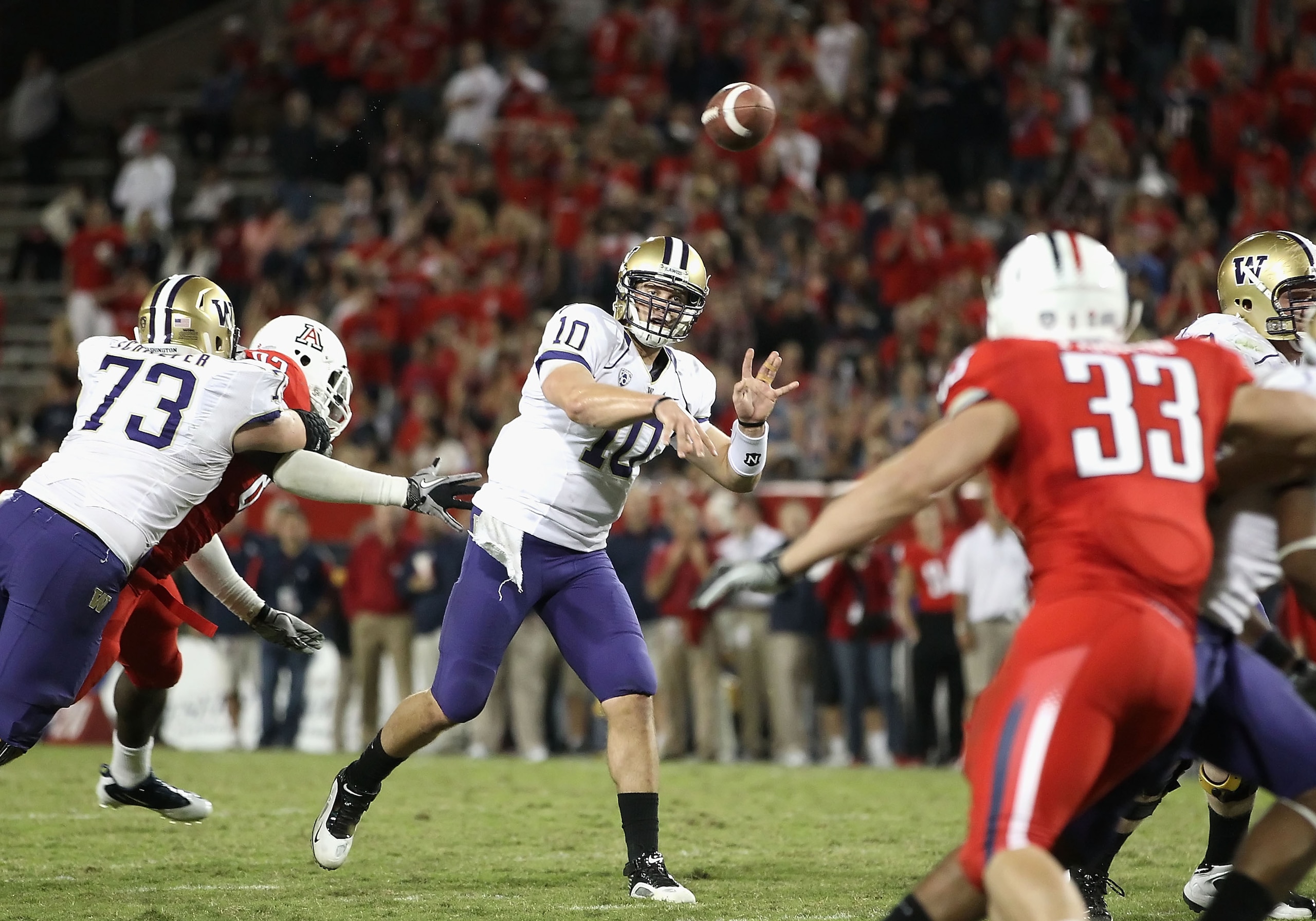 TUCSON, AZ - OCTOBER 23: Quarterback Jake Locker #10 of the Washington Huskies drops back to pass during the college football game against the Arizona Wildcats at Arizona Stadium on October 23, 2010 in Tucson, Arizona. The Wildcats defeated the Huskies 4 TUCSON, AZ - OCTOBER 23: Quarterback Jake Locker #10 of the Washington Huskies drops back to pass during the college football game against the Arizona Wildcats at Arizona Stadium on October 23, 2010 in Tucson, Arizona. The Wildcats defeated the Huskies 4
