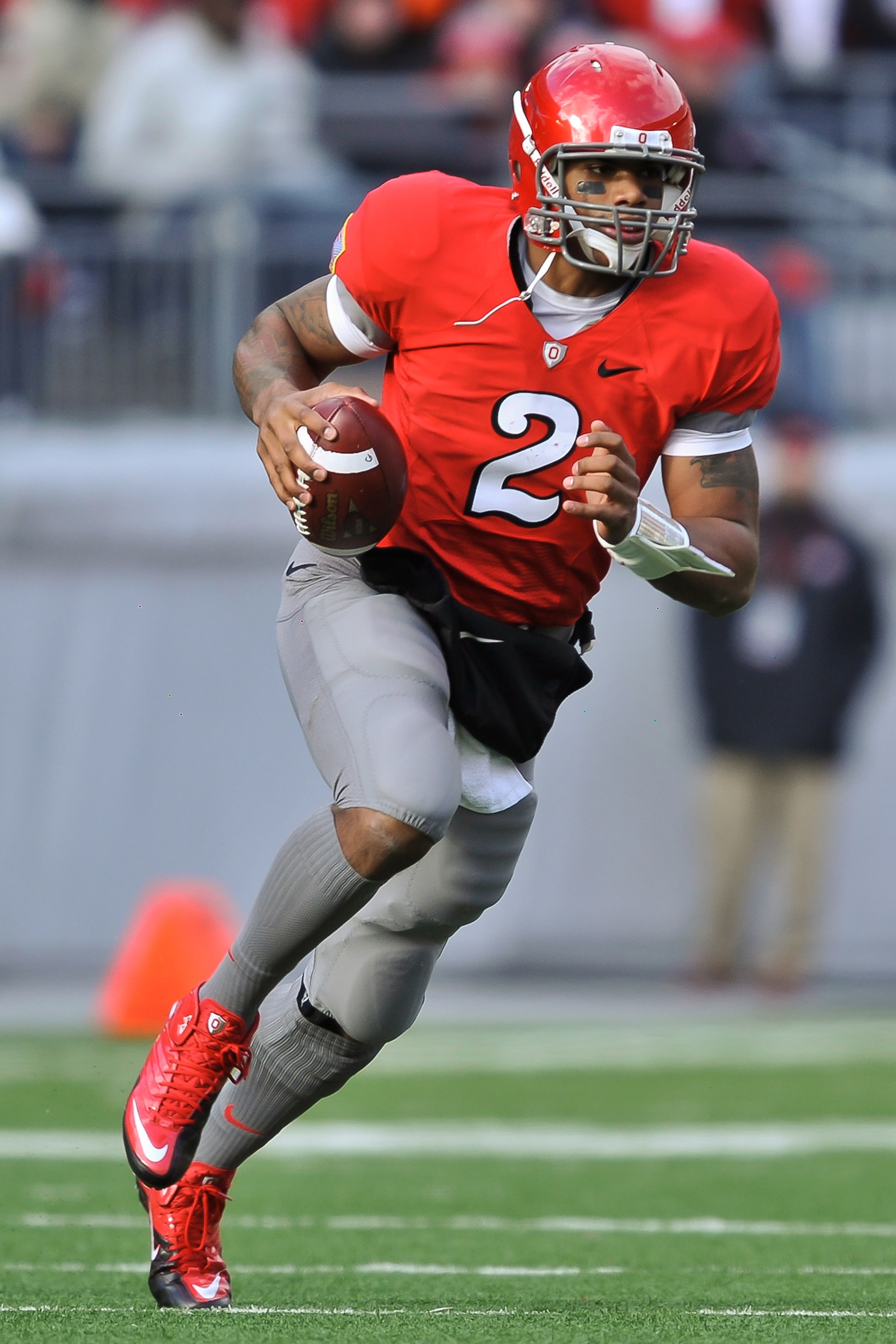 COLUMBUS, OH - NOVEMBER 27:  Quarterback Terrelle Pryor #2 of the Ohio State Buckeyes runs with the ball against the Michigan Wolverines at Ohio Stadium on November 27, 2010 in Columbus, Ohio.  (Photo by Jamie Sabau/Getty Images)