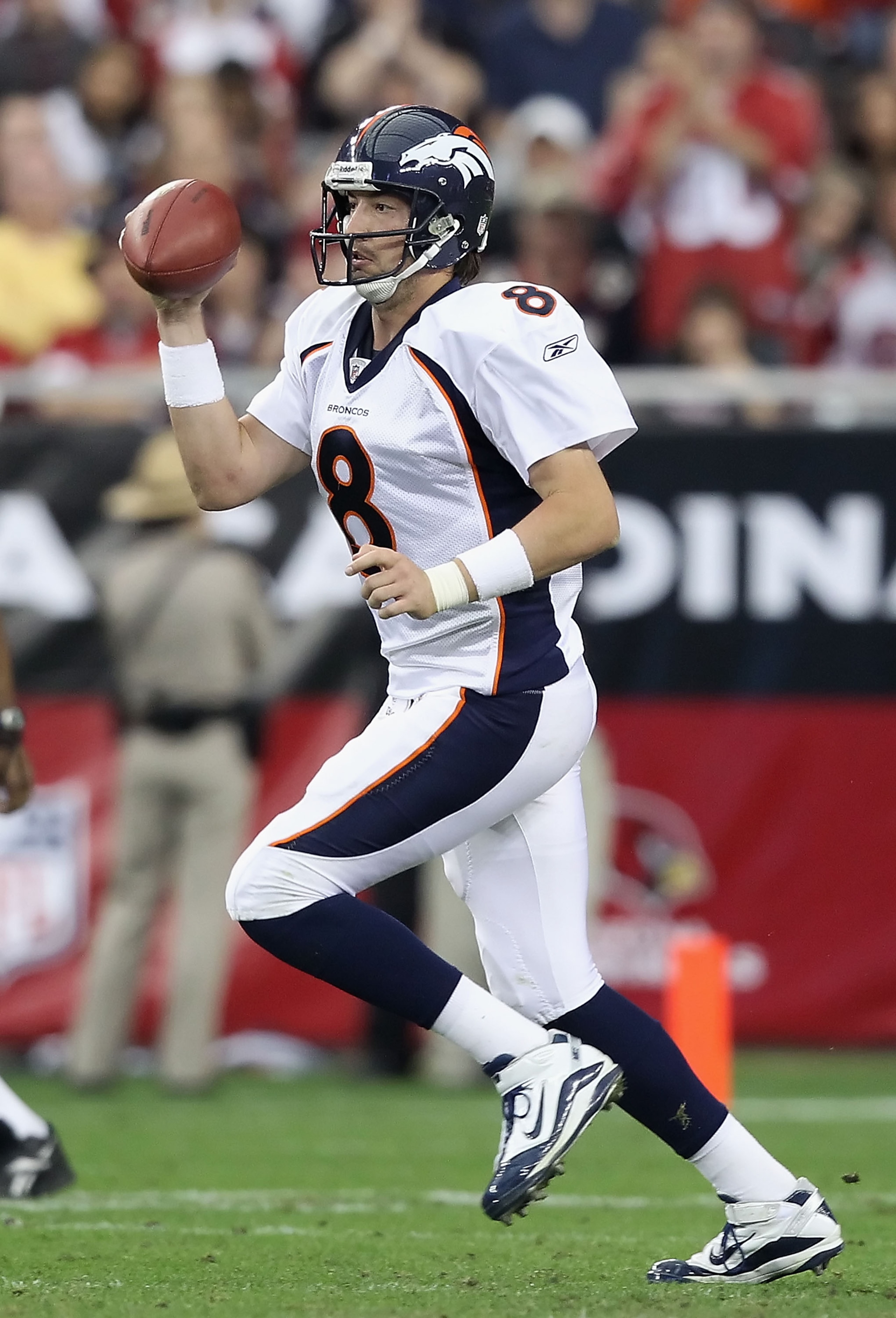 GLENDALE, AZ - DECEMBER 12:  Quarterback Kyle Orton #8 of the Denver Broncos drops back to pass during the NFL game against the Arizona Cardinals at the University of Phoenix Stadium on December 12, 2010 in Glendale, Arizona.  The Cardinals defeated the B