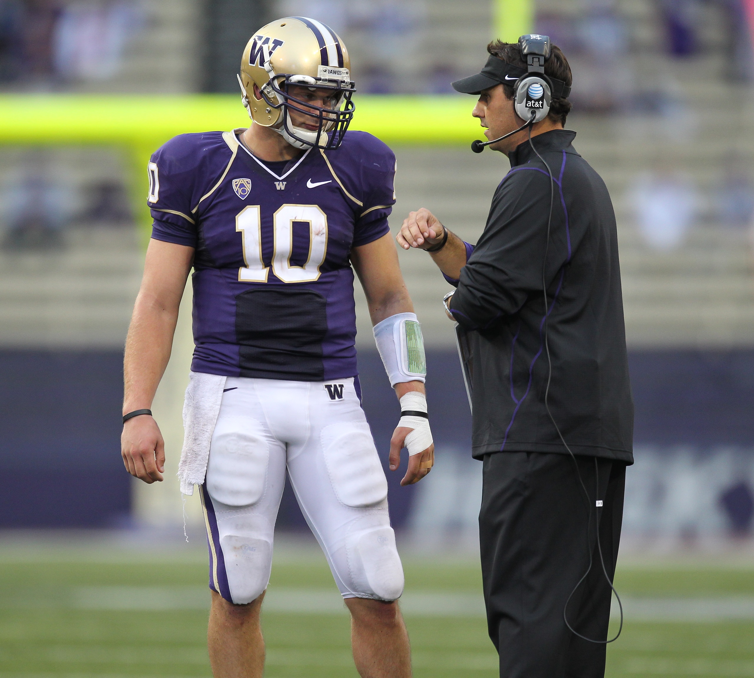 SEATTLE - SEPTEMBER 11: Head coach Steve Sarkisian of the Washington Huskies talks with quarterback Jake Locker #10 during the game against the Syracuse Orange on September 11, 2010 at Husky Stadium in Seattle, Washington. (Photo by Otto Greule Jr/Getty SEATTLE - SEPTEMBER 11: Head coach Steve Sarkisian of the Washington Huskies talks with quarterback Jake Locker #10 during the game against the Syracuse Orange on September 11, 2010 at Husky Stadium in Seattle, Washington. (Photo by Otto Greule Jr/Getty