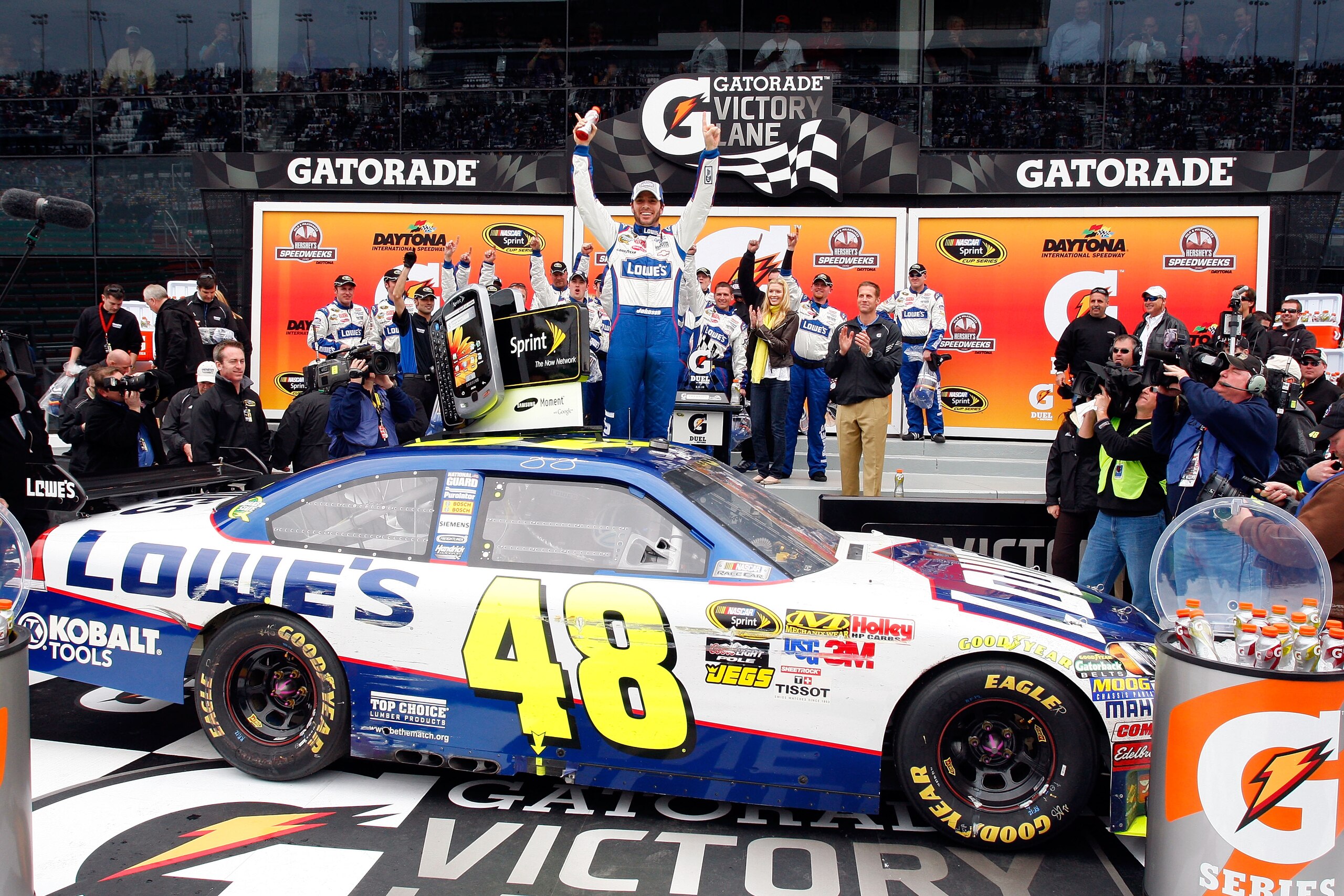 DAYTONA BEACH, FL - FEBRUARY 11:  Jimmie Johnson, driver of the #48 Lowe's Chevrolet, celebrates in Victory Lane after winning the first NASCAR Sprint Cup Series Gatorade Duel at Daytona International Speedway on February 11, 2010 in Daytona Beach, Florid