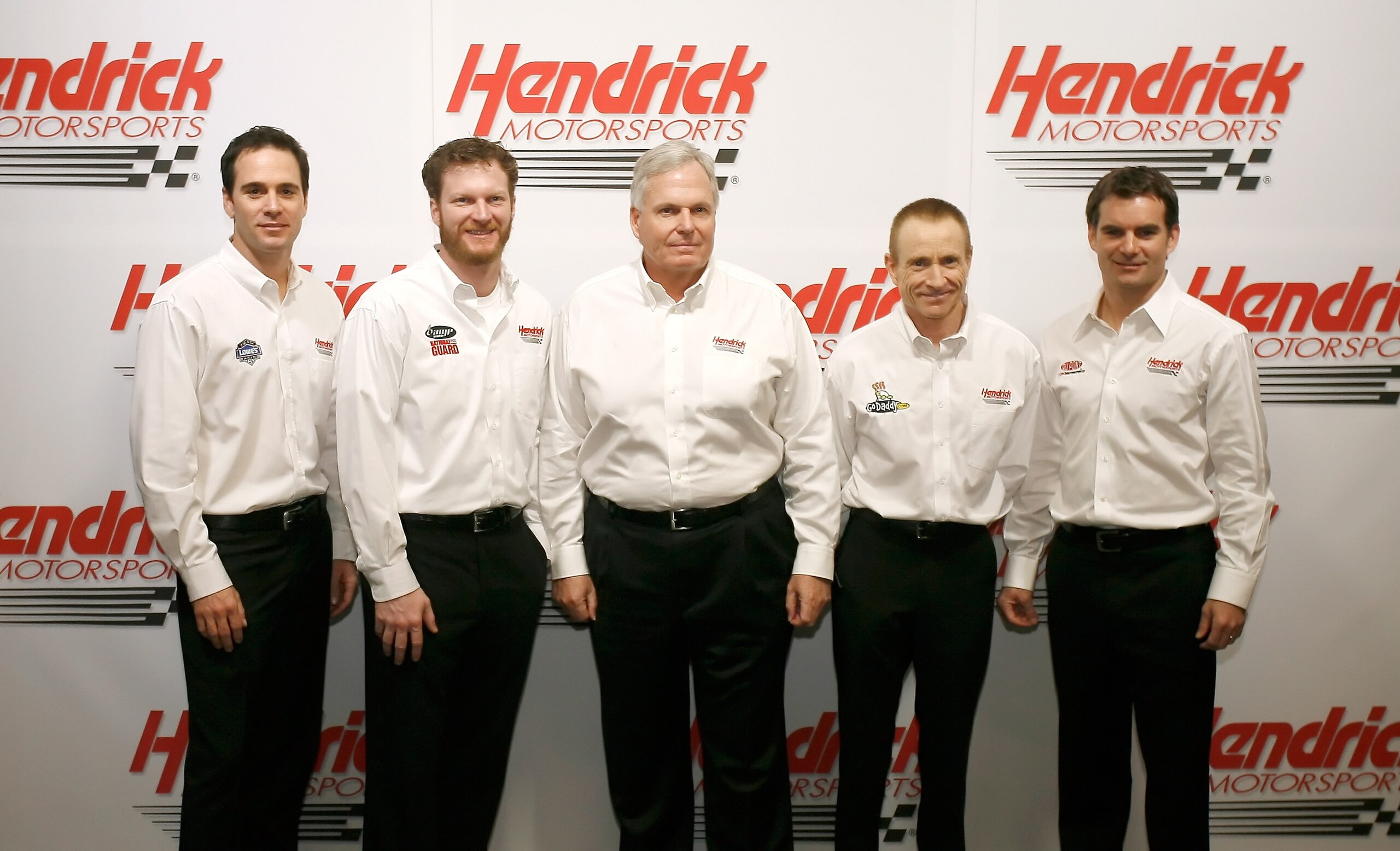 CONCORD, NC - JANUARY 20:  NASCAR team owner Rick Hendrick (C) poses with  Jimmie Johnson (1L), driver of the #48 Lowe's Chevrolet, Dale Earnhardt Jr. (2L), driver of the #88 AMP Energy/National Guard Chevrolet, Mark Martin (2R), driver of the #5 GoDaddy.