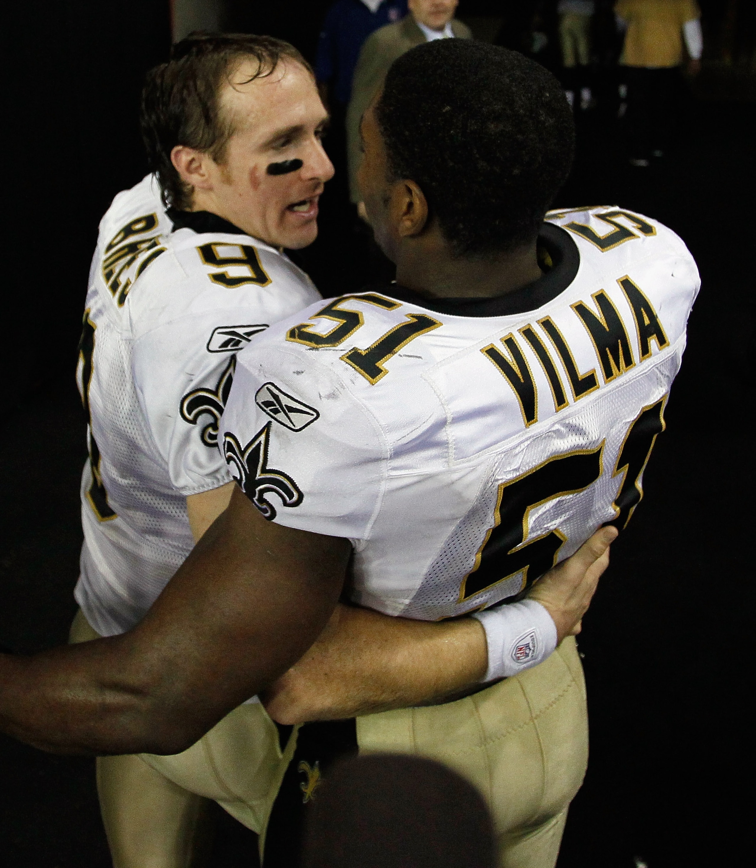 ATLANTA, GA - DECEMBER 27:  Quarterback Drew Brees #9 of the New Orleans Saints celebrates with Jonathan Vilma #51 after defeating the Atlanta Falcons 17-14 at the Georgia Dome on December 27, 2010 in Atlanta, Georgia.  (Photo by Kevin C. Cox/Getty Images