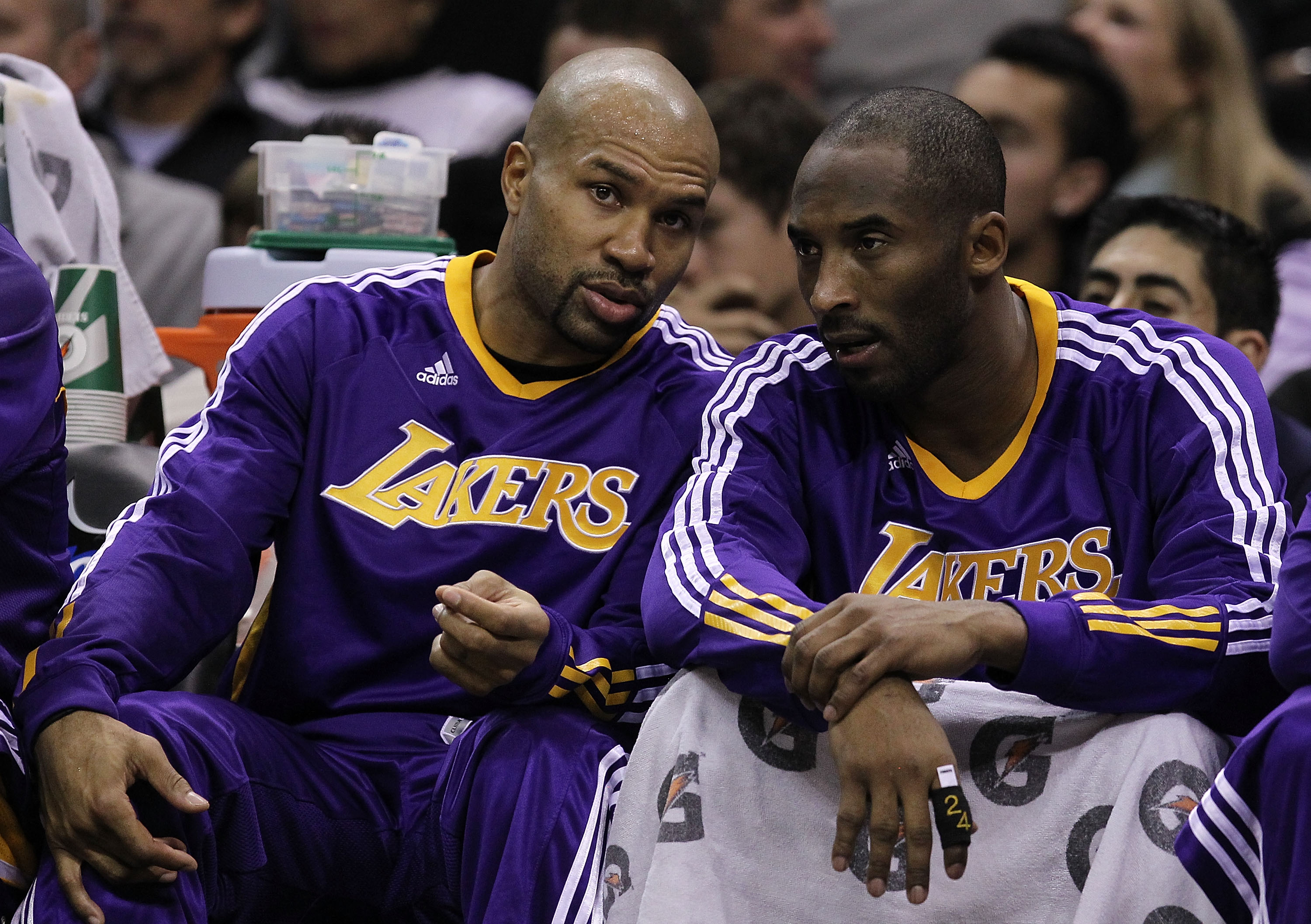 SAN ANTONIO, TX - DECEMBER 28:  Guard Derek Fisher #2 and Kobe Bryant #24 of the Los Angeles Lakers at AT&T Center on December 28, 2010 in San Antonio, Texas.  NOTE TO USER: User expressly acknowledges and agrees that, by downloading and/or using this pho