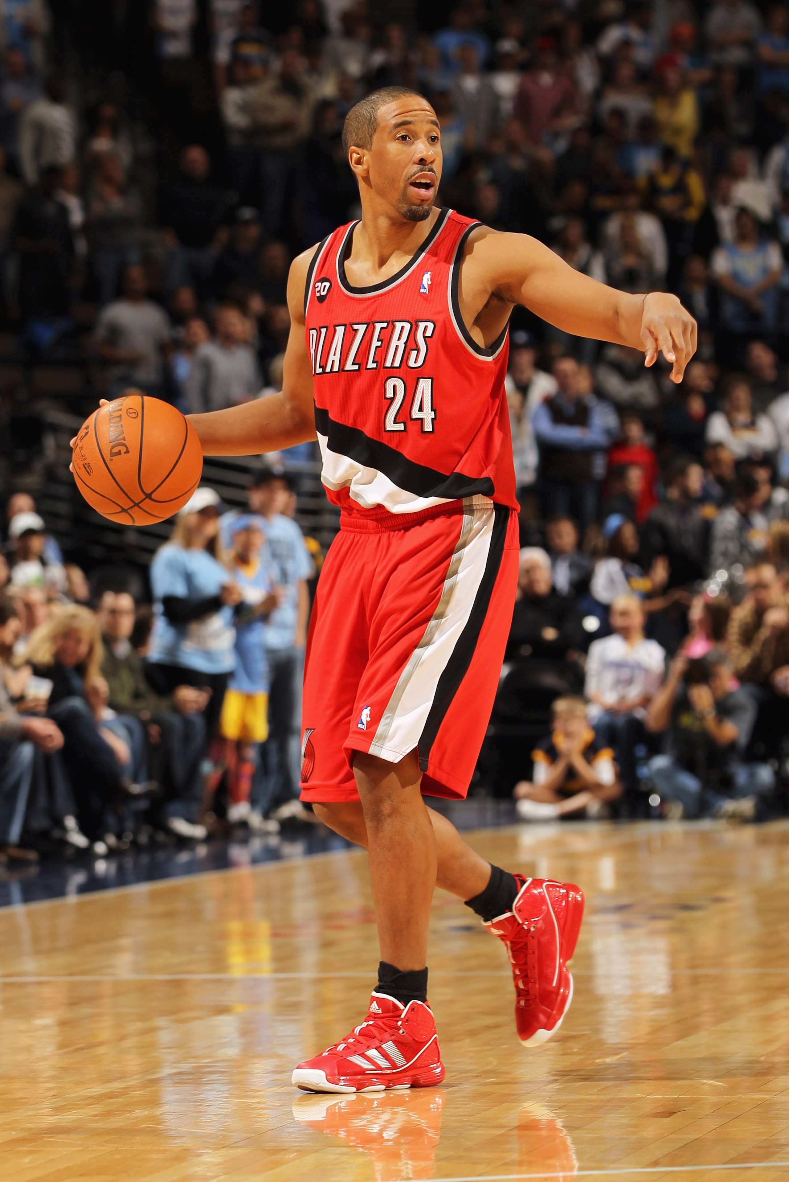 DENVER - DECEMBER 28:  Andre Miller #24 of the Portland Trail Blazers dribbles the ball against the Denver Nuggets at Pepsi Center on December 28, 2010 in Denver, Colorado. The Nuggets defeated the Blazers 95-77. NOTE TO USER: User expressly acknowledges